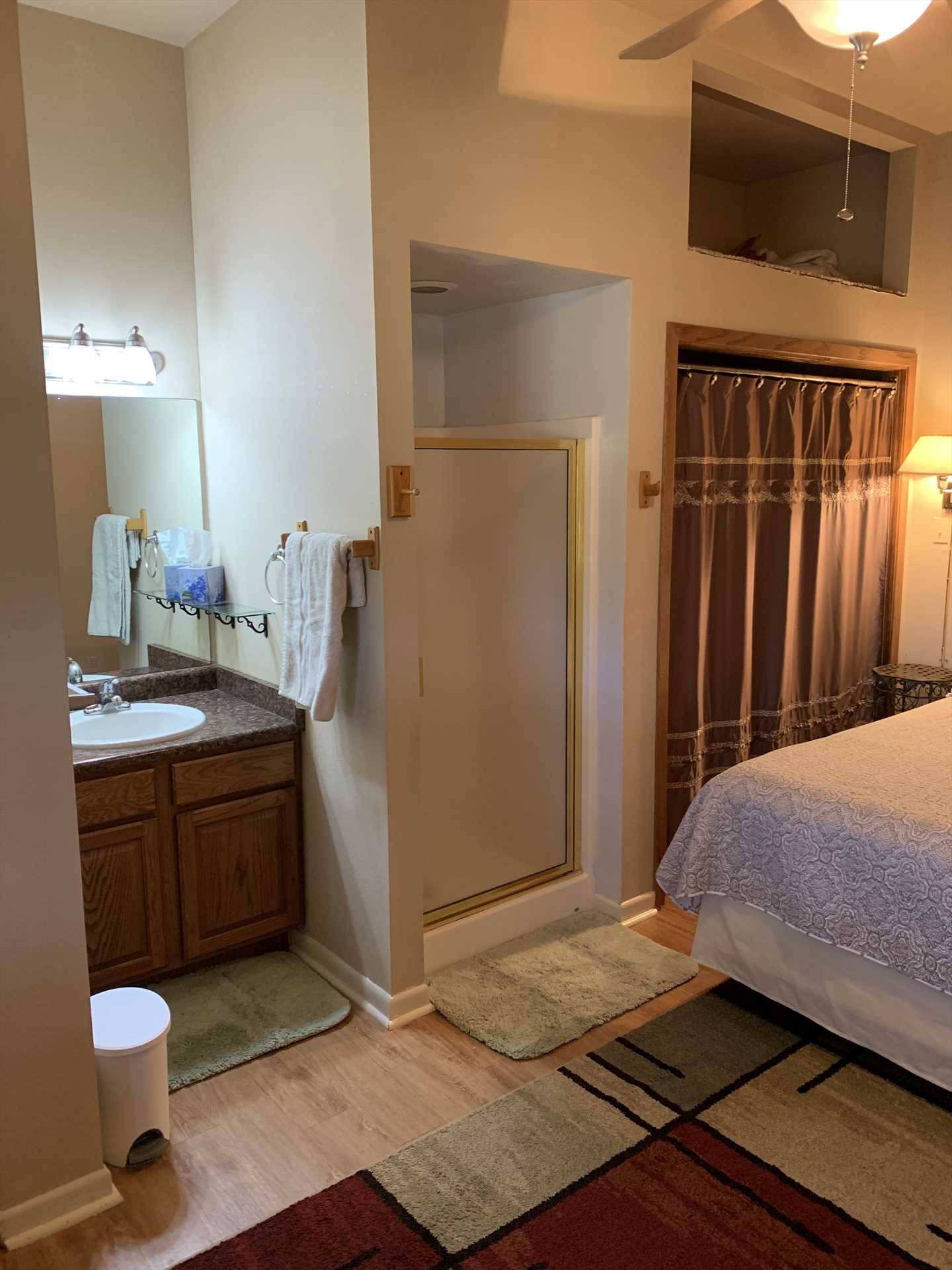                                                 Cleanup's a breeze in the shower and mirrored vanity-and all bed and bath linens are provided for your stay.