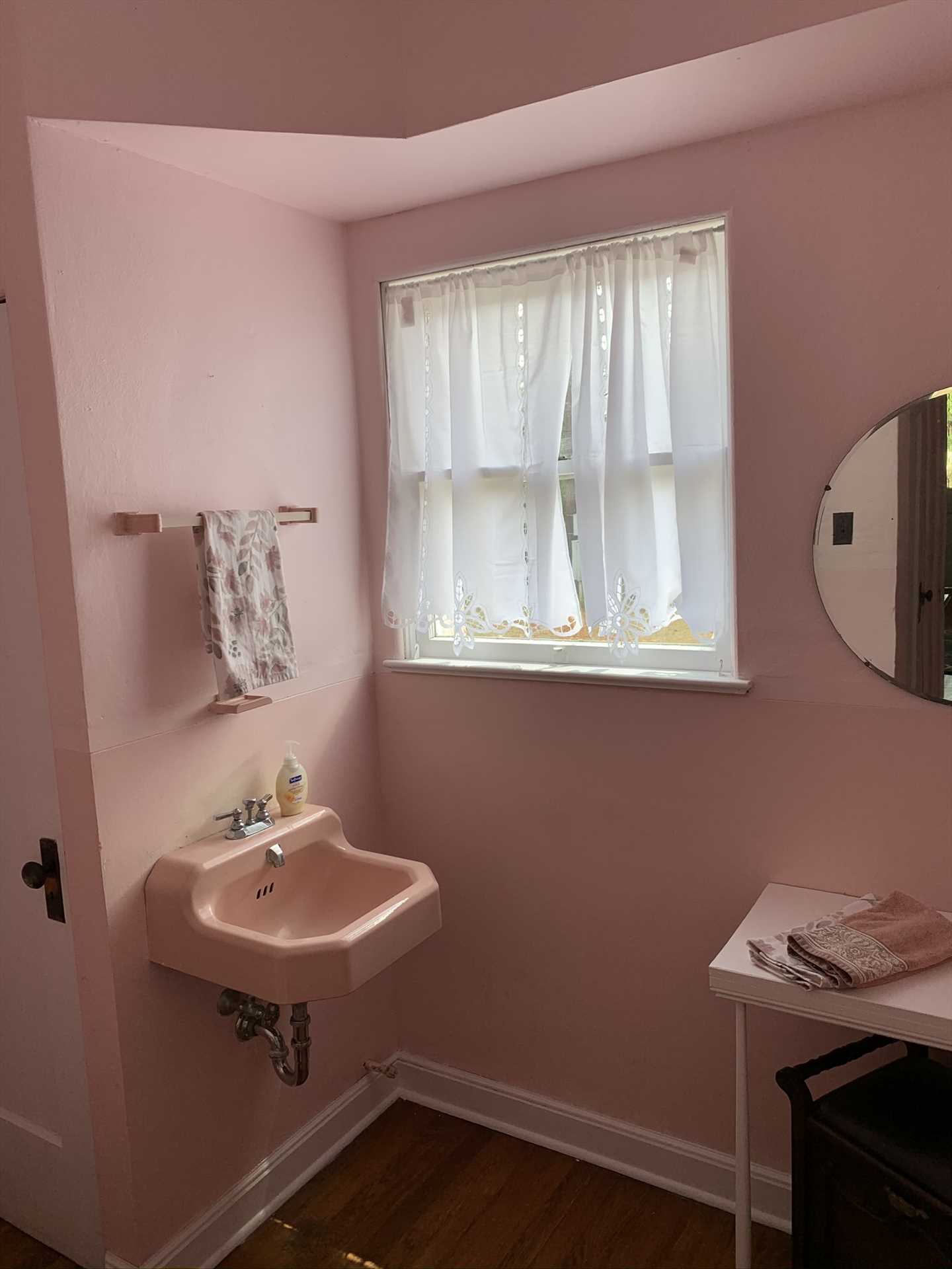                                                 The downstairs level of the River Home includes this clean and convenient half-bath. All the bathrooms and bedrooms here include complimentary linens.