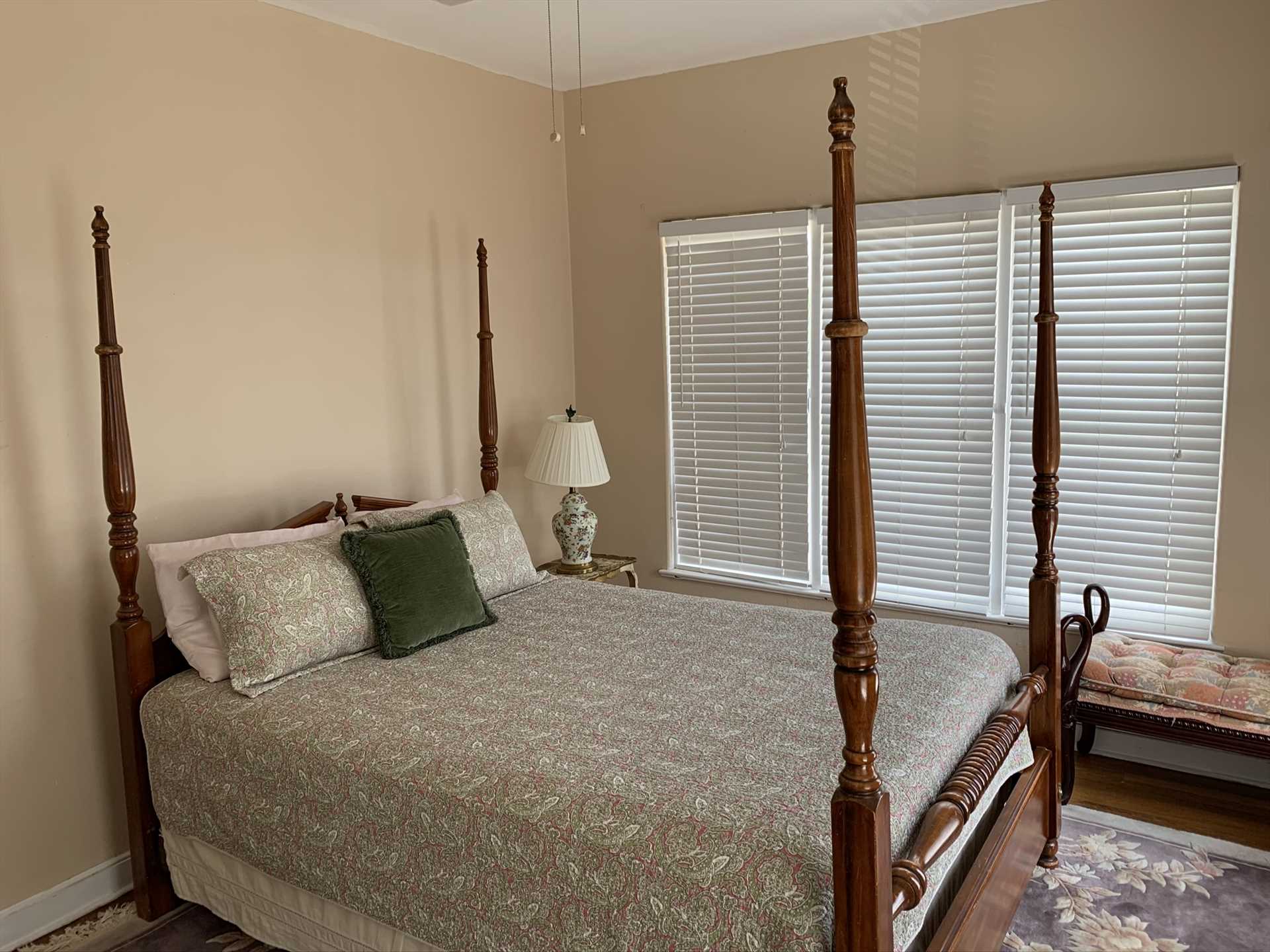                                                 A four-poster queen-sized bed in the master bedroom provides a little slice of history and a lot of restful slumber!