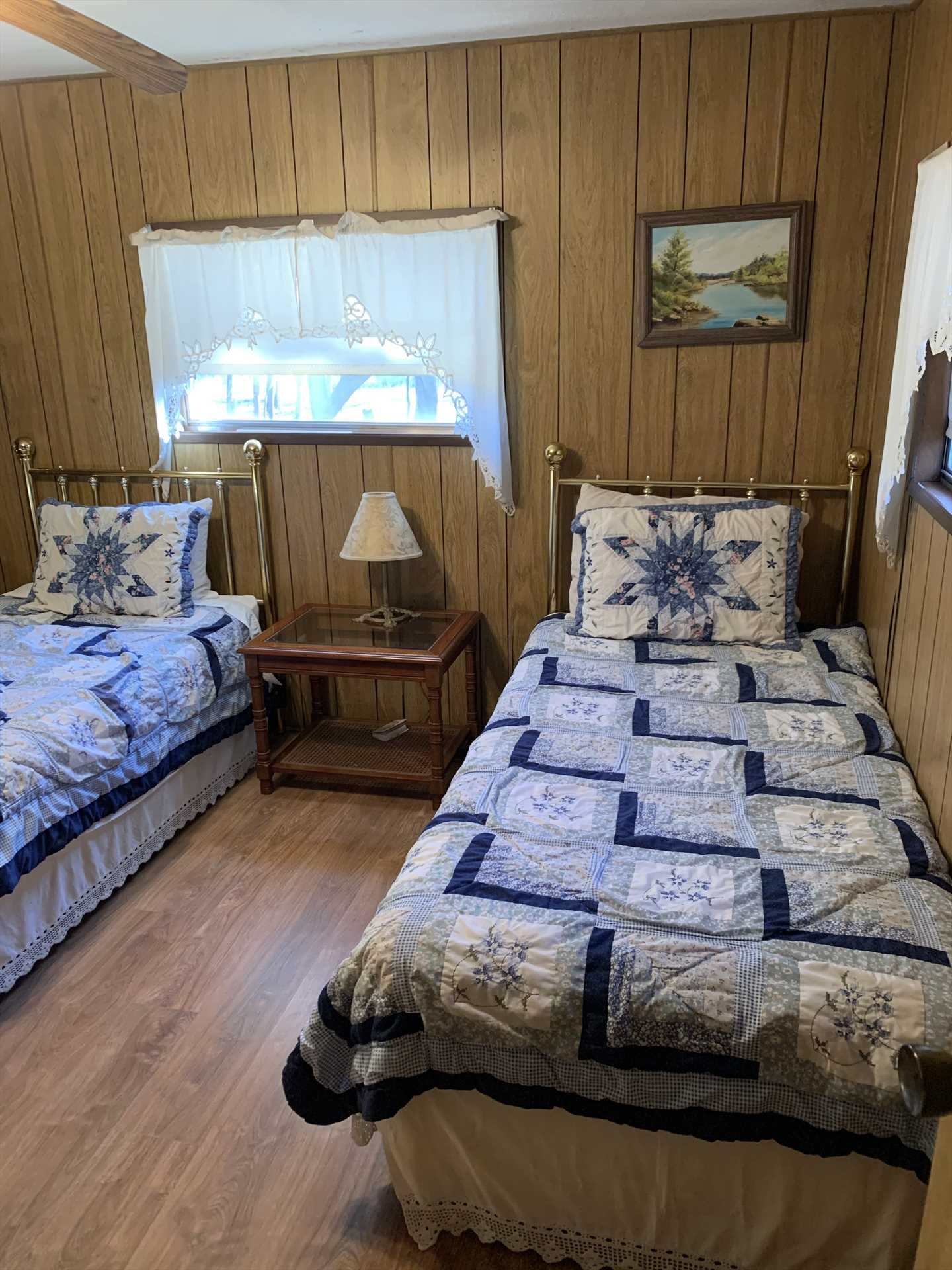                                                 Two more guests can sleep in soft comfort in the second bedroom, equipped with matching twin beds.