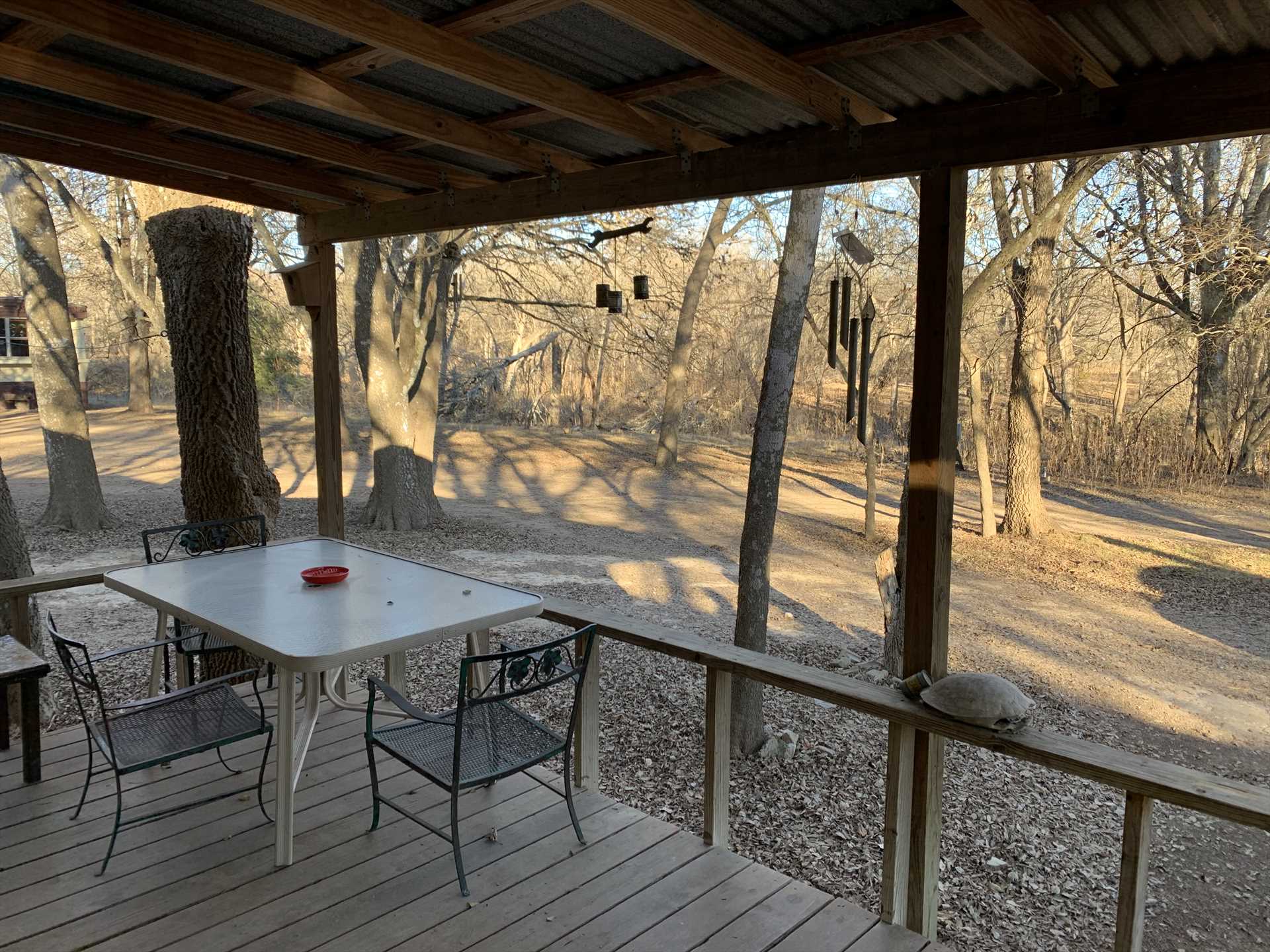                                                 You can almost hear the wind chimes! The shaded patio is a great spot to watch wildlife and admire some of the Hill Country's natural beauty.