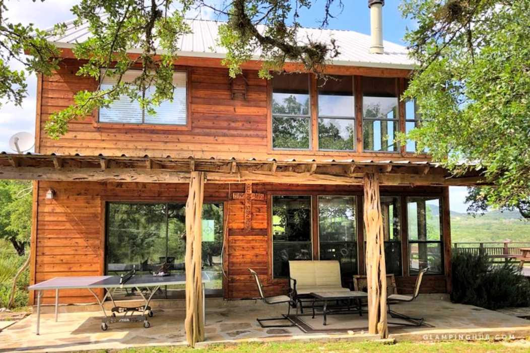                                                 Two stories of Hill Country heaven! Kids and pets are welcome at the Rockin' B Ranch Bluff House, making it a fantastic family getaway.