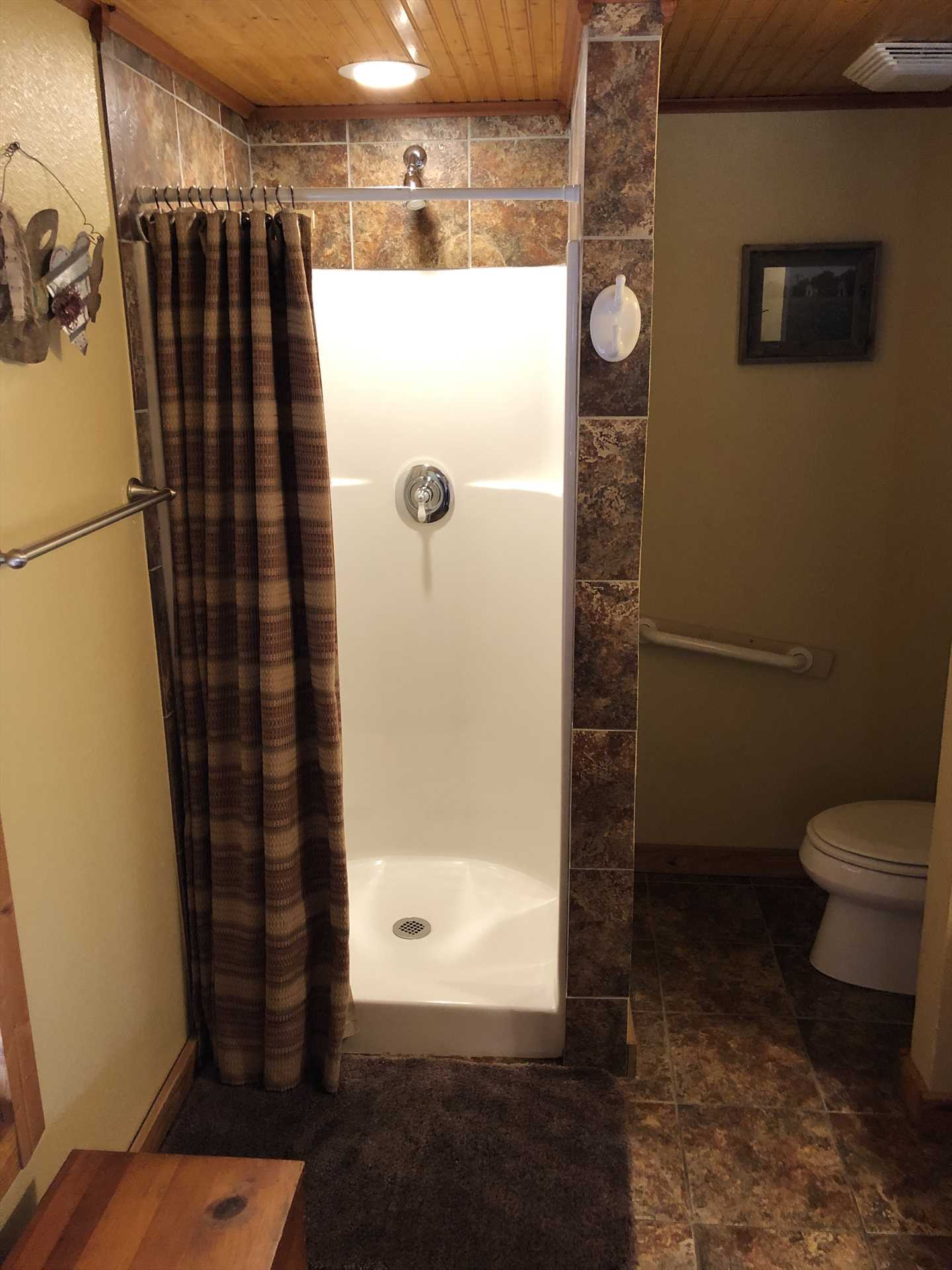                                                 Your full bath here is spotlessly clean, and features a shower and plenty of clean linens.