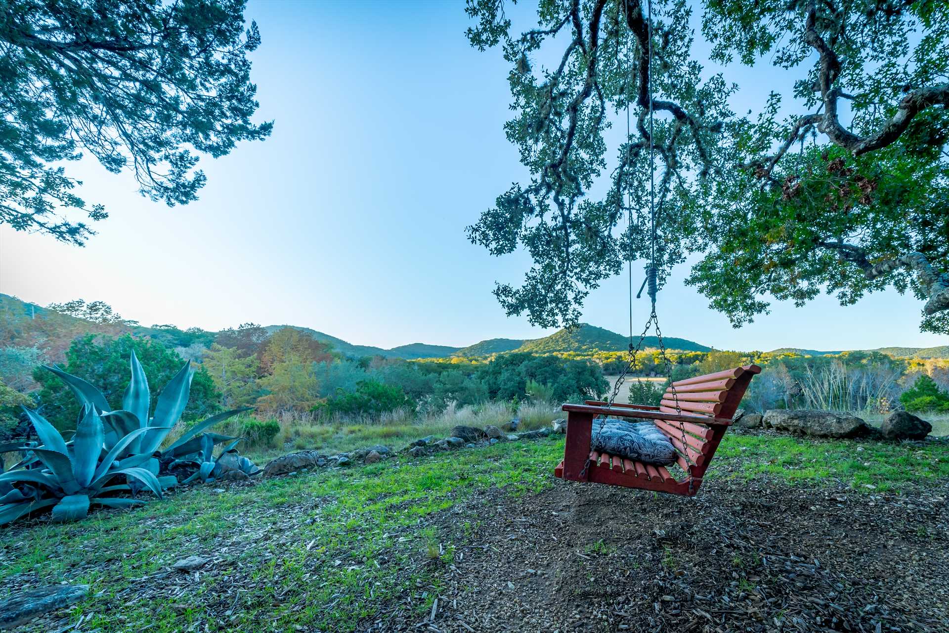                                                 You'll want to take a seat on the swing here! It's a wonderful romantic setting, and the mountain views are breathtaking.