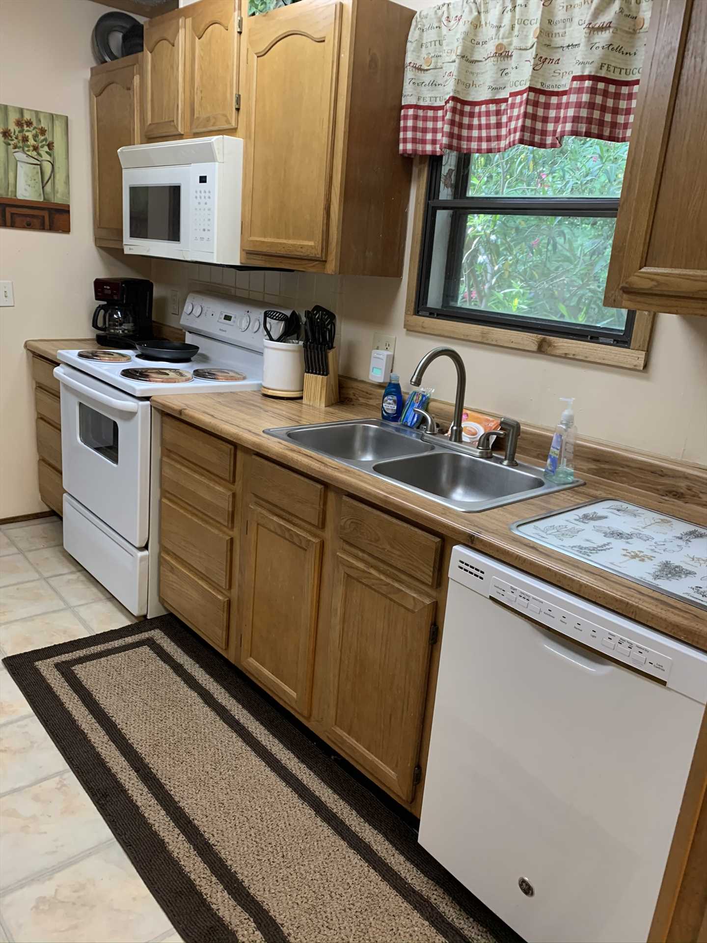                                                 The kitchen at the Lodge is decked out with everything your resident chefs will need, and all will be served in comfort at the dining and gaming tables nearby.