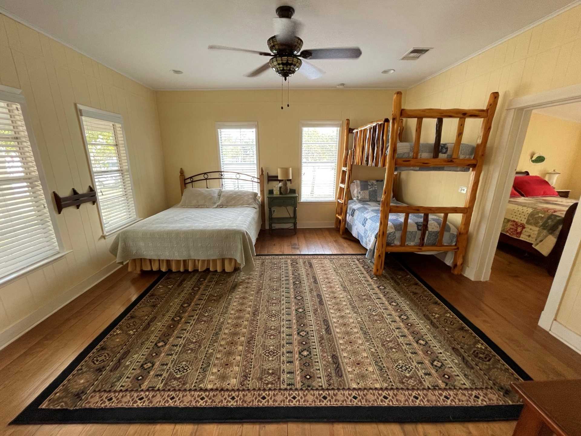                                                 Soft and warm queen and twin bunk beds comfortably sleep up to four guests in the second bedroom. Clean linens are included, too!