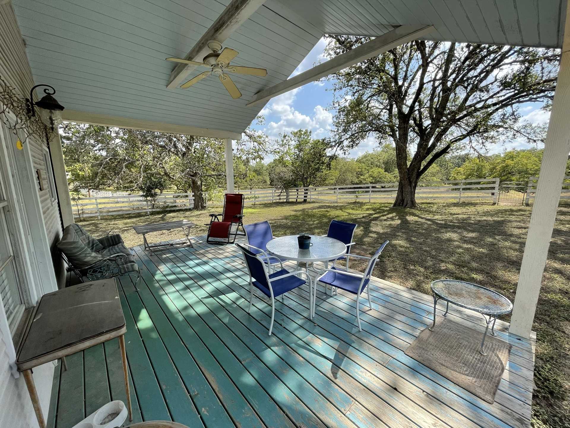                                                 There's plenty of room for kids to have fun in the back yard, and the shaded deck is perfect for conversation and savoring the inspiring Hill Country views!