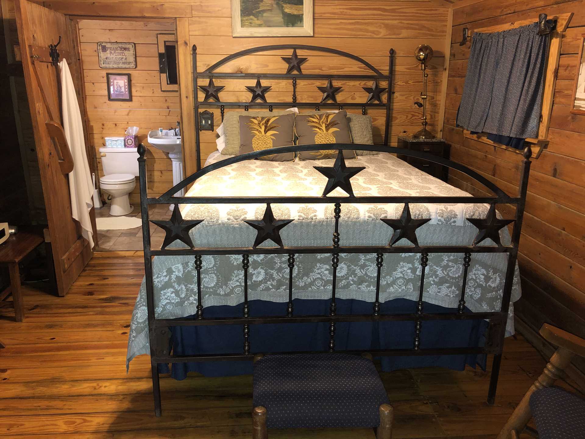                                                 Check out the uniquely-Texan Lone Star frame on the big and comfortable queen-sized bed!