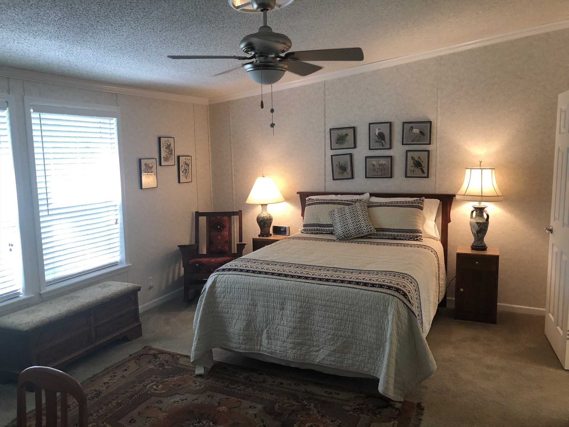                                                 The master bedroom features a queen-sized bed, and all three bedrooms feature fluffy and soft bed linens.