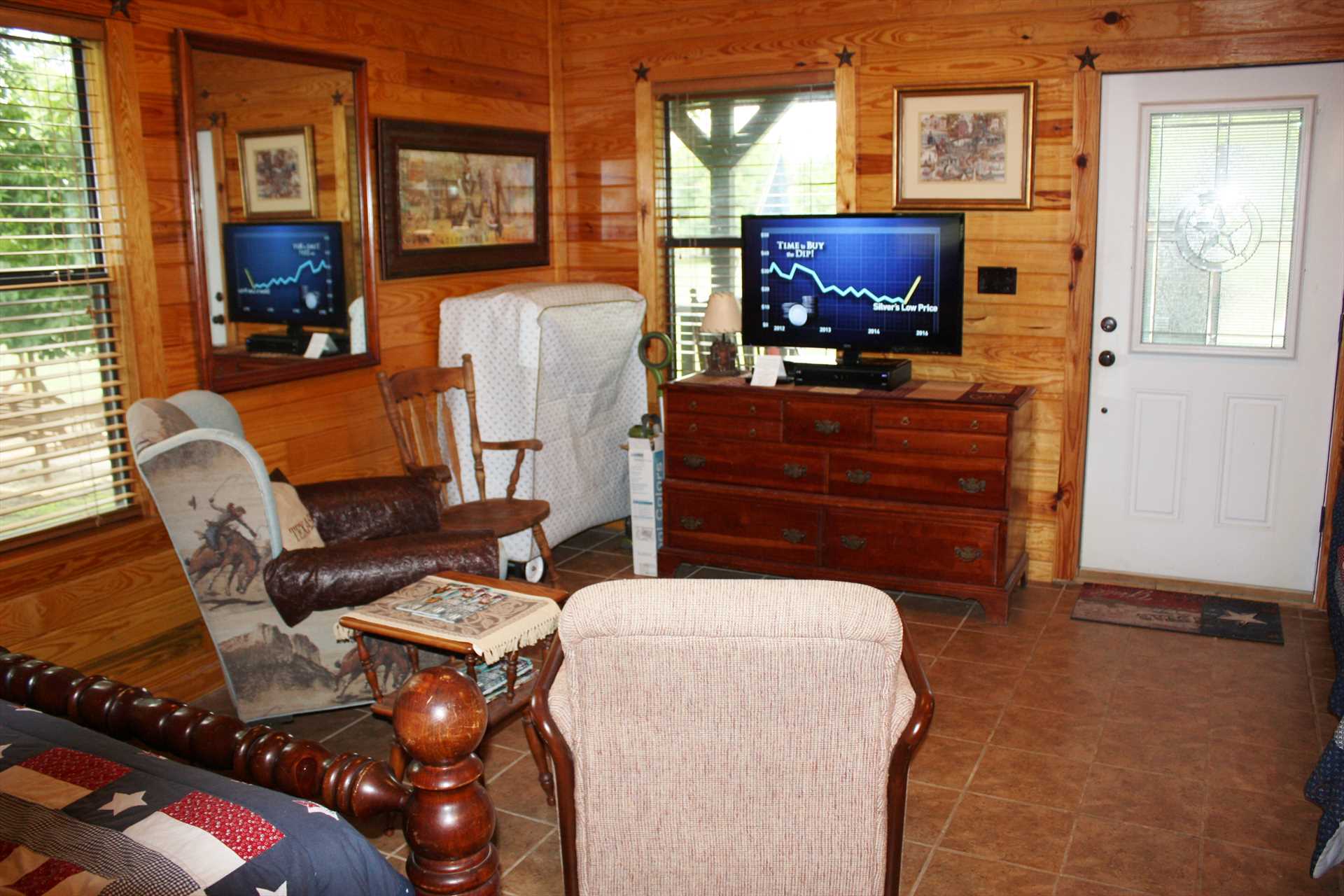                                                 Matching woodwork and flooring give the cabin a warm glow, which is also equipped with satellite TV, wireless Internet, and super-comfy AC and heating.