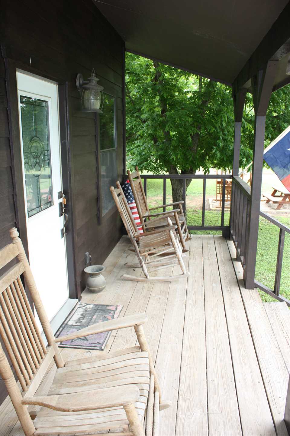                                                 Stretch your legs and enjoy a peaceful moment or two on the country-style rockers on the front porch!