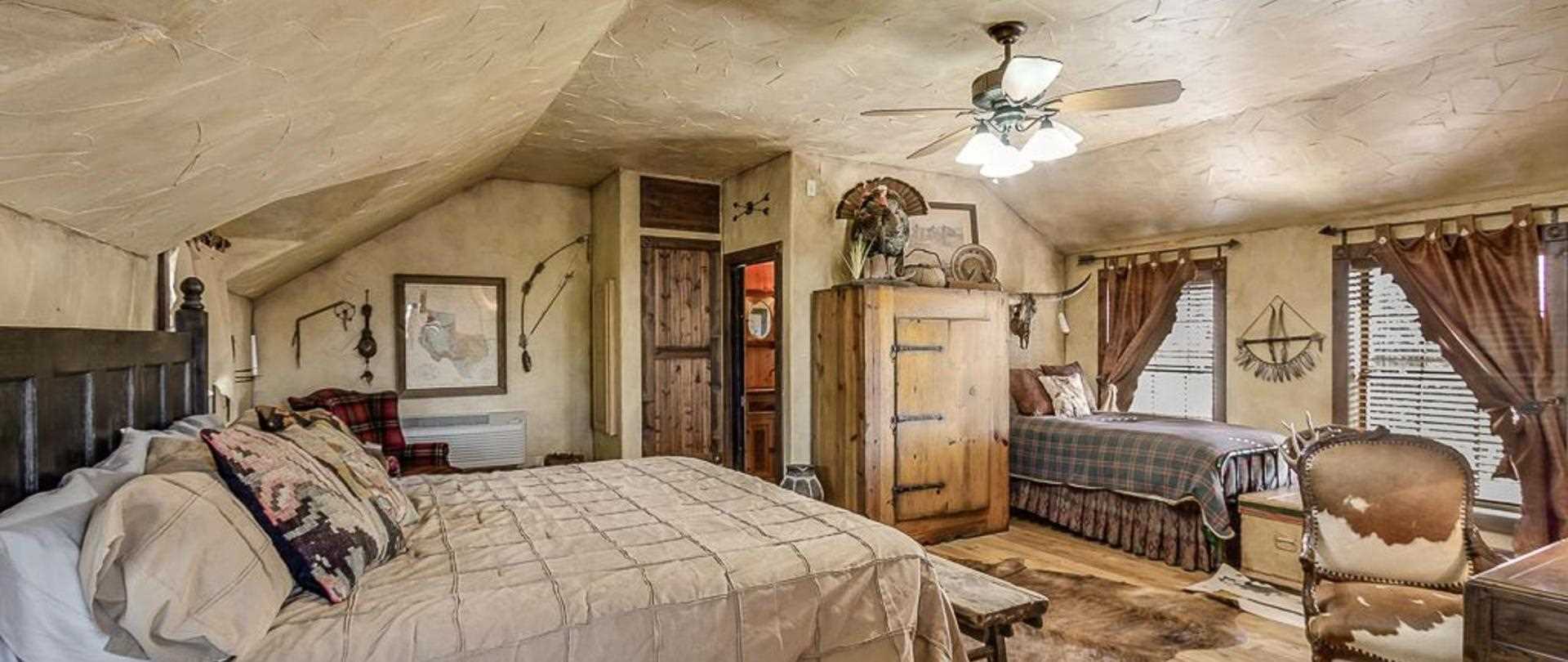                                                 The rustic style of the master suite is something you'll never find in a motel room!