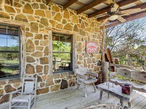                                                 Rustic and sturdy stone and wood construction give the Ranch House that authentic Texas pioneer look and feel.