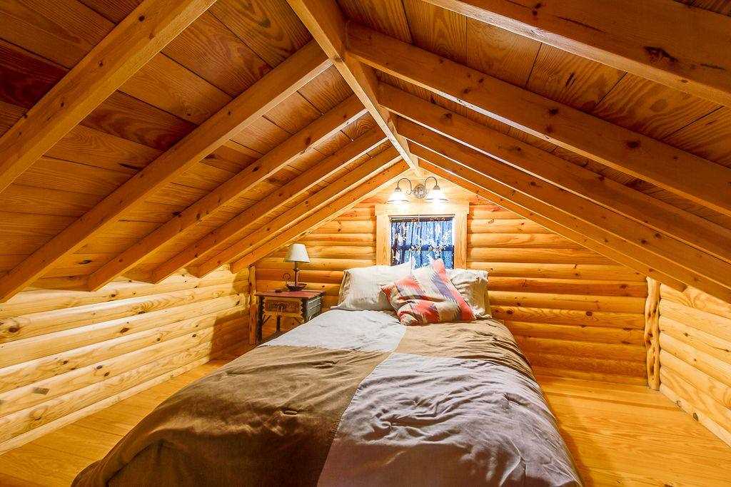                                                Rest your head on the plush queen-sized bed up in the loft! The bed and bathroom both come with a full supply of clean linens.