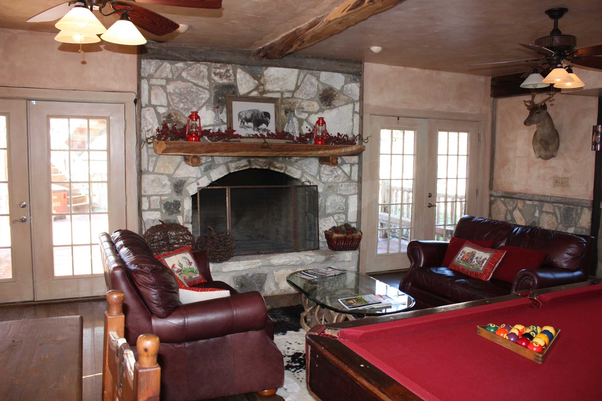                                                Commune with your fellow guests in climate-controlled comfort, on the main floor of the lodge, you'll find both a fireplace and pool table.