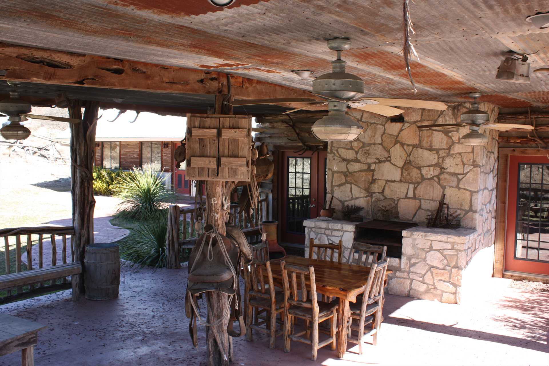                                                 Cool breezes and shaded comfort surround the grill on the lower level patio.
