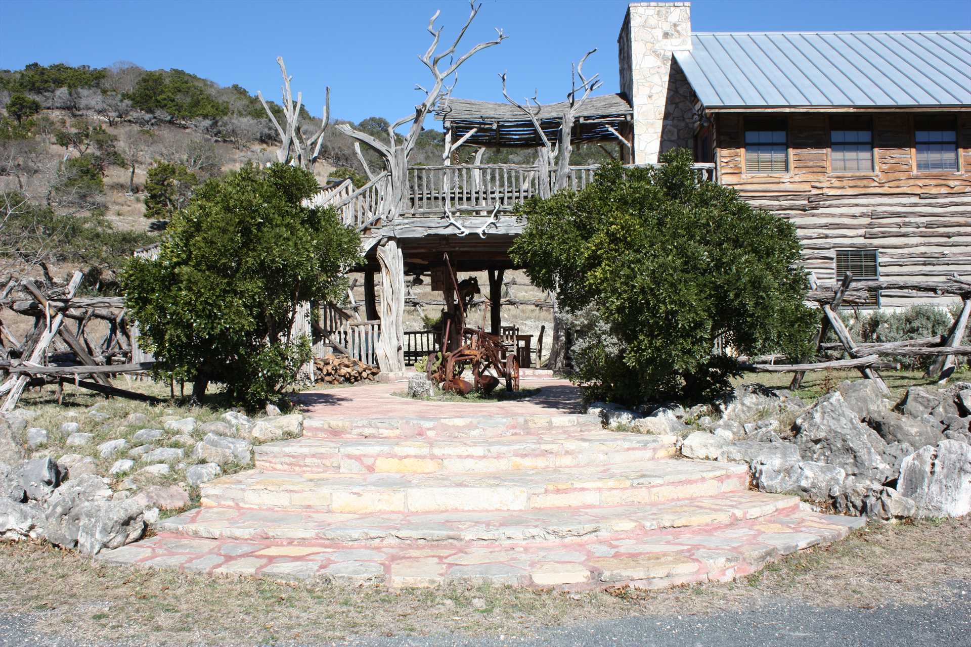                                                 Immaculate grounds and rustic western lodge atmosphere greet you to this wonderful Hill Country hideaway!
