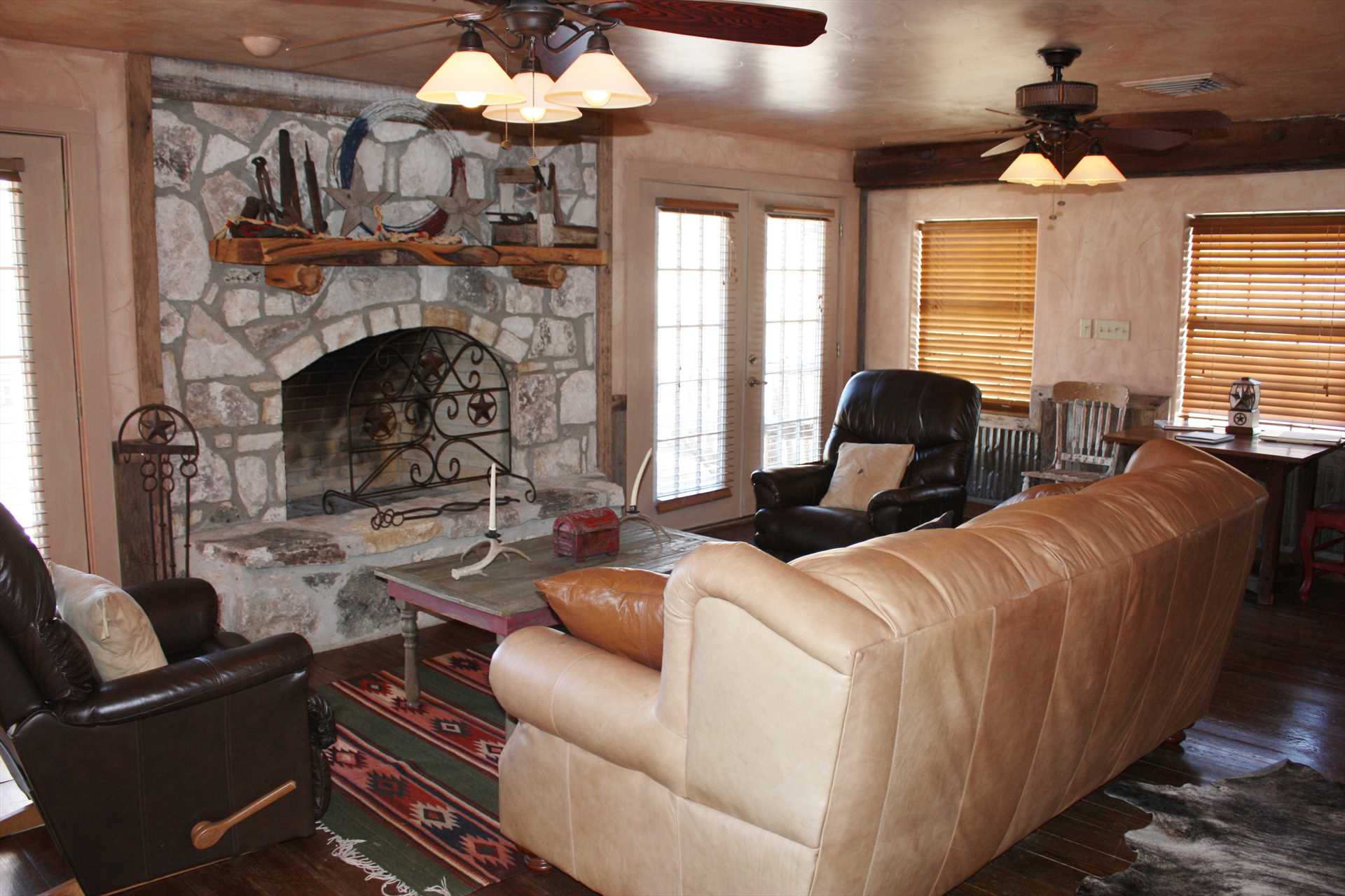                                                 Both the upstairs and downstairs living areas at the ranch feature the welcoming ambience created by fireplaces.