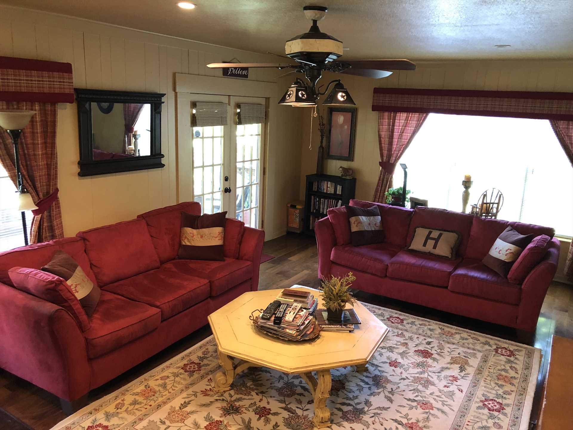                                                 Central air and heating, along with ceiling fans, assure every moment is comfortable here. The living area features a fireplace and cable TV, and there's wireless Internet service everywhere!