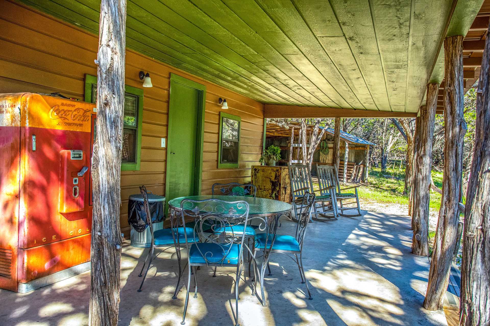                                                 Savor the peace of the surrounding Hill Country in the shaded comfort of the porch, complete with plenty of outdoor furniture.