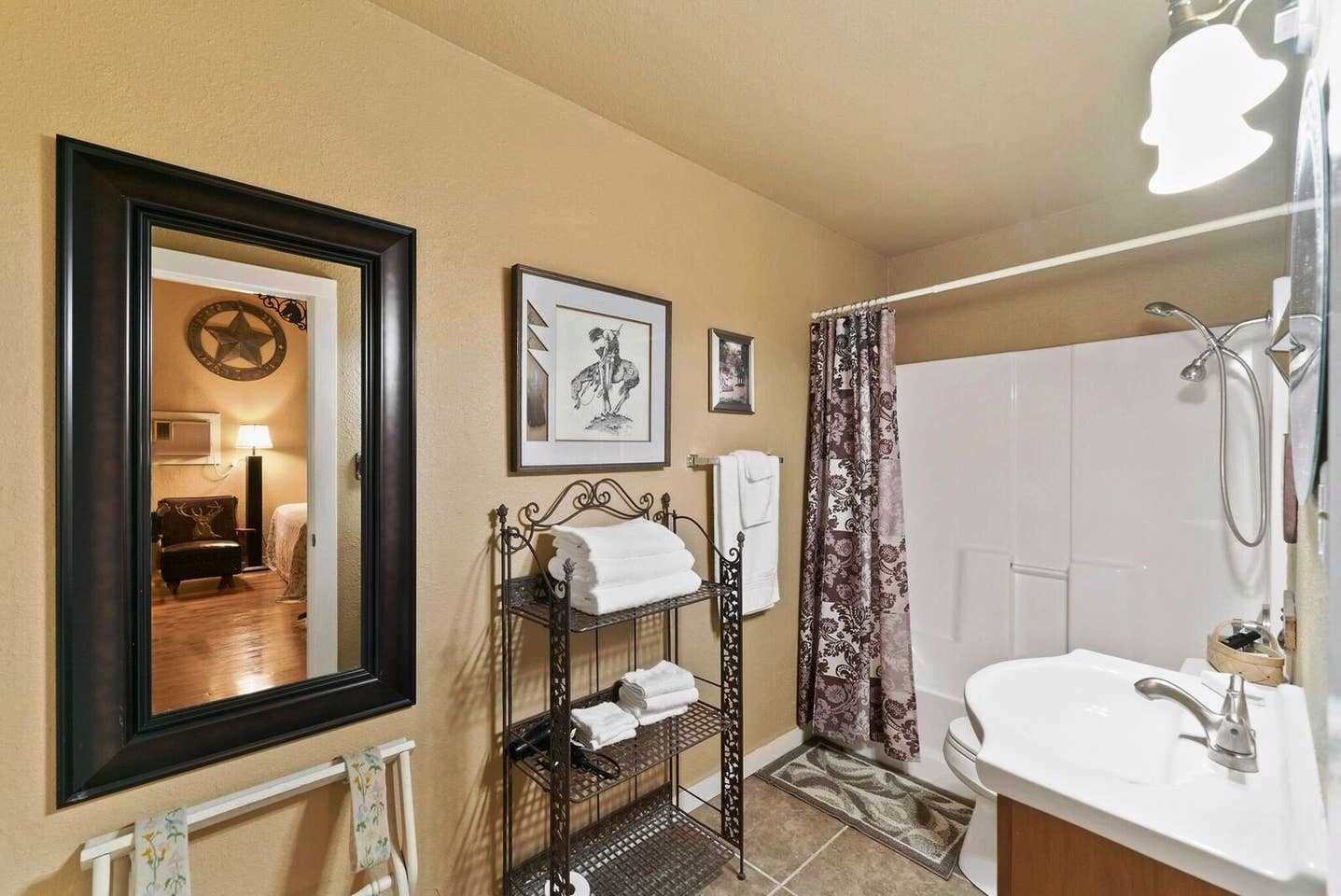                                                 The full bath is furnished with a shower and tub combo and big vanity-and all bed and bath linens are included.