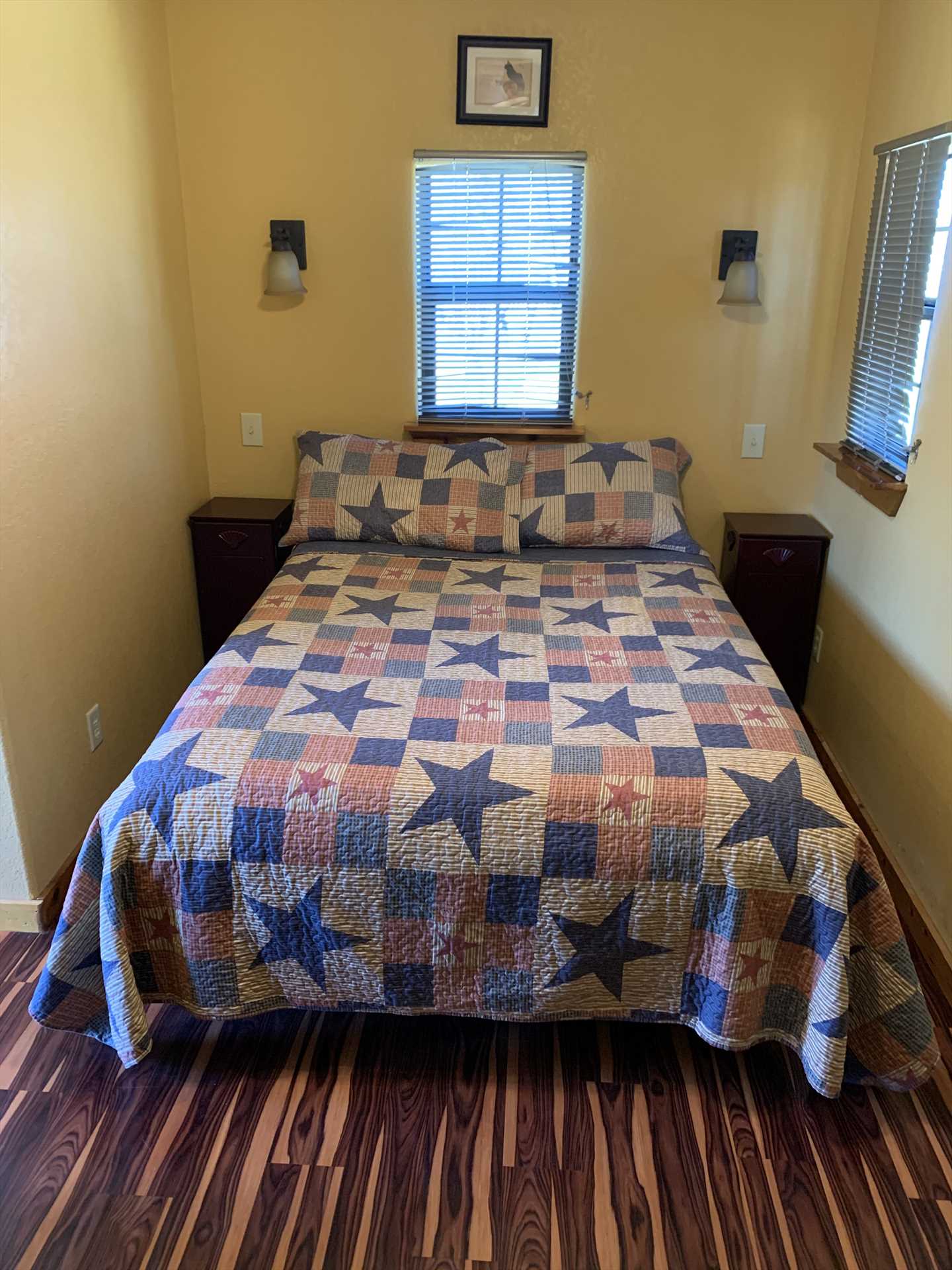                                                 The queen bed provides sweet slumber for two, and there is a roll-away bed option available for a third guest.