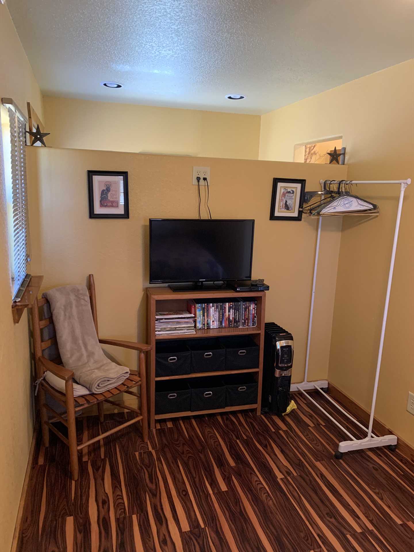                                                 The TV here includes a DVD player, and there's also a CD player in the living area, it's a great spot to unwind, or to plan your day!