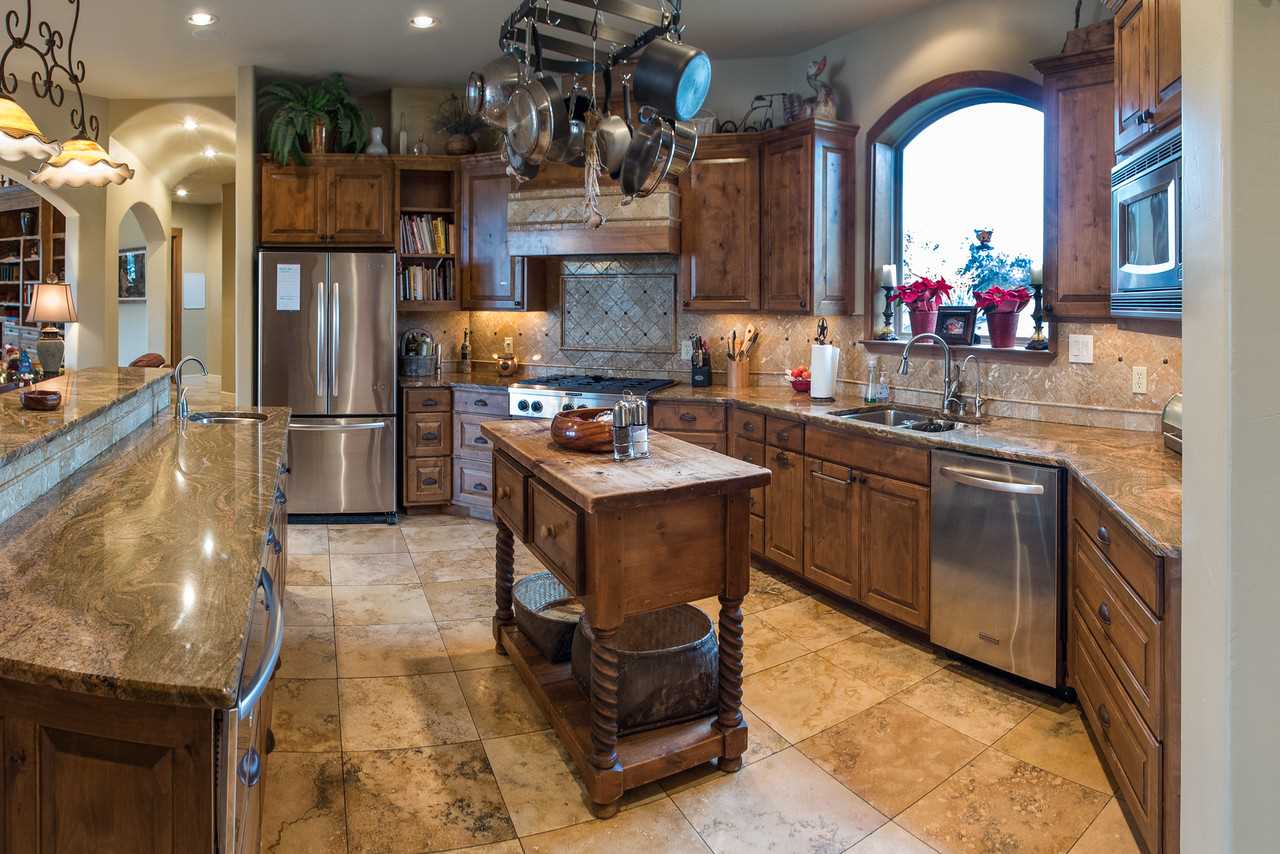                                                 The well-appointed kitchen here is absolutely massive! No matter how many cooks you have in your crew, they'll all have space to show off here.