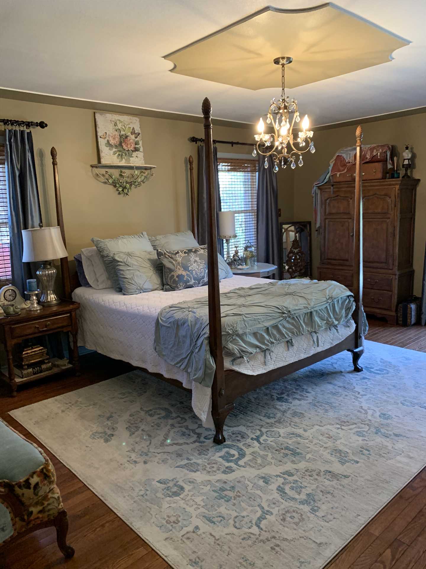                                                 Rest like ranch royalty in the big and comfy queen-sized bed in the downstairs master bedroom! Fresh and clean linens are provided for all the beds at Water's Edge.