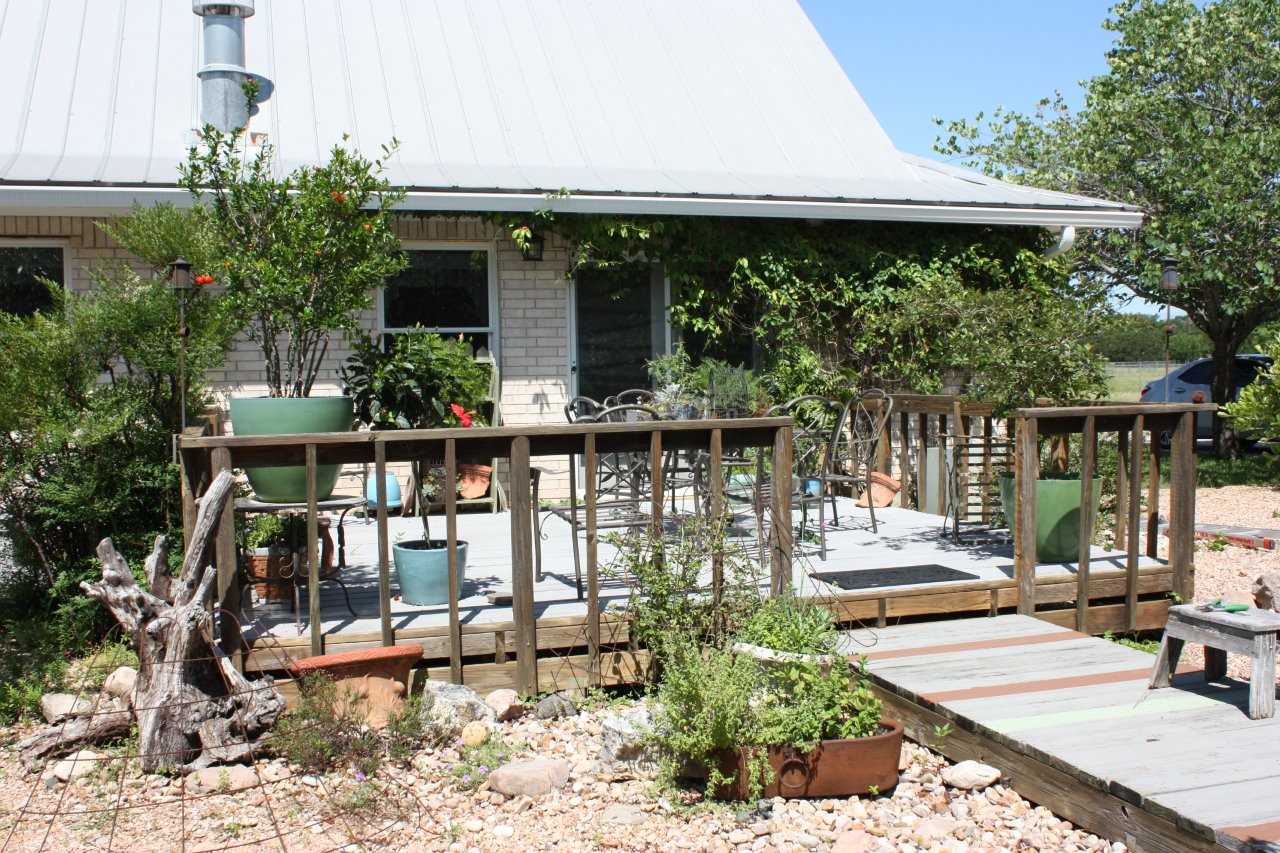                                                 Beautiful plants on the deck help the guest house blend in perfectly with the gorgeous flora of the Hill Country!
