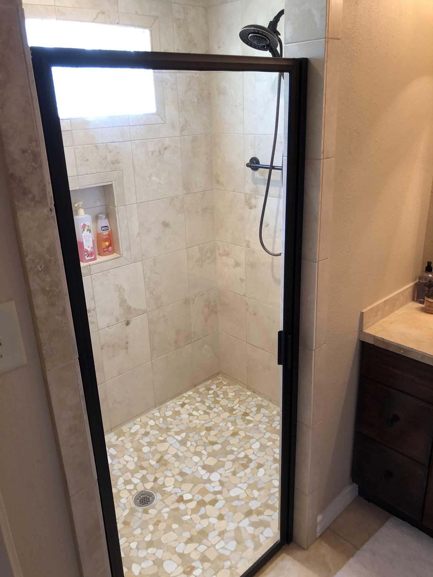                                                 Check out this roomy shower stall in the master bath! Both bathrooms, and all the beds, are furnished with clean linens and towels.