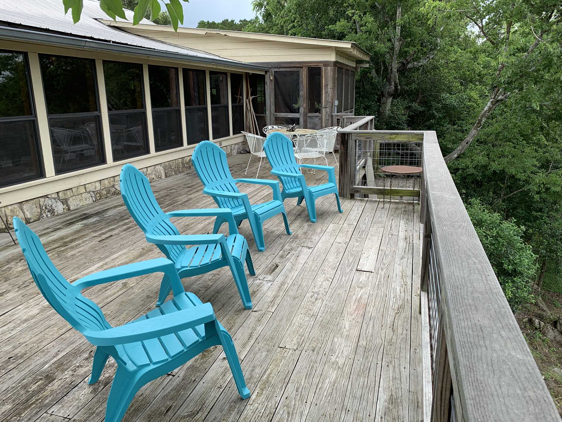                                                 The sunny back deck is a great spot to stargaze and enjoy panoramic Hill Country views.