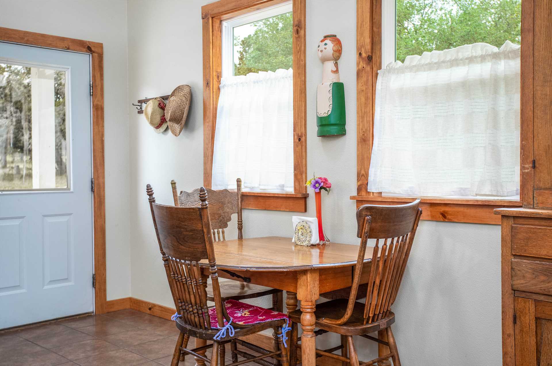                                                 Along with seating around the kitchen island, there's also a cozy dining nook.