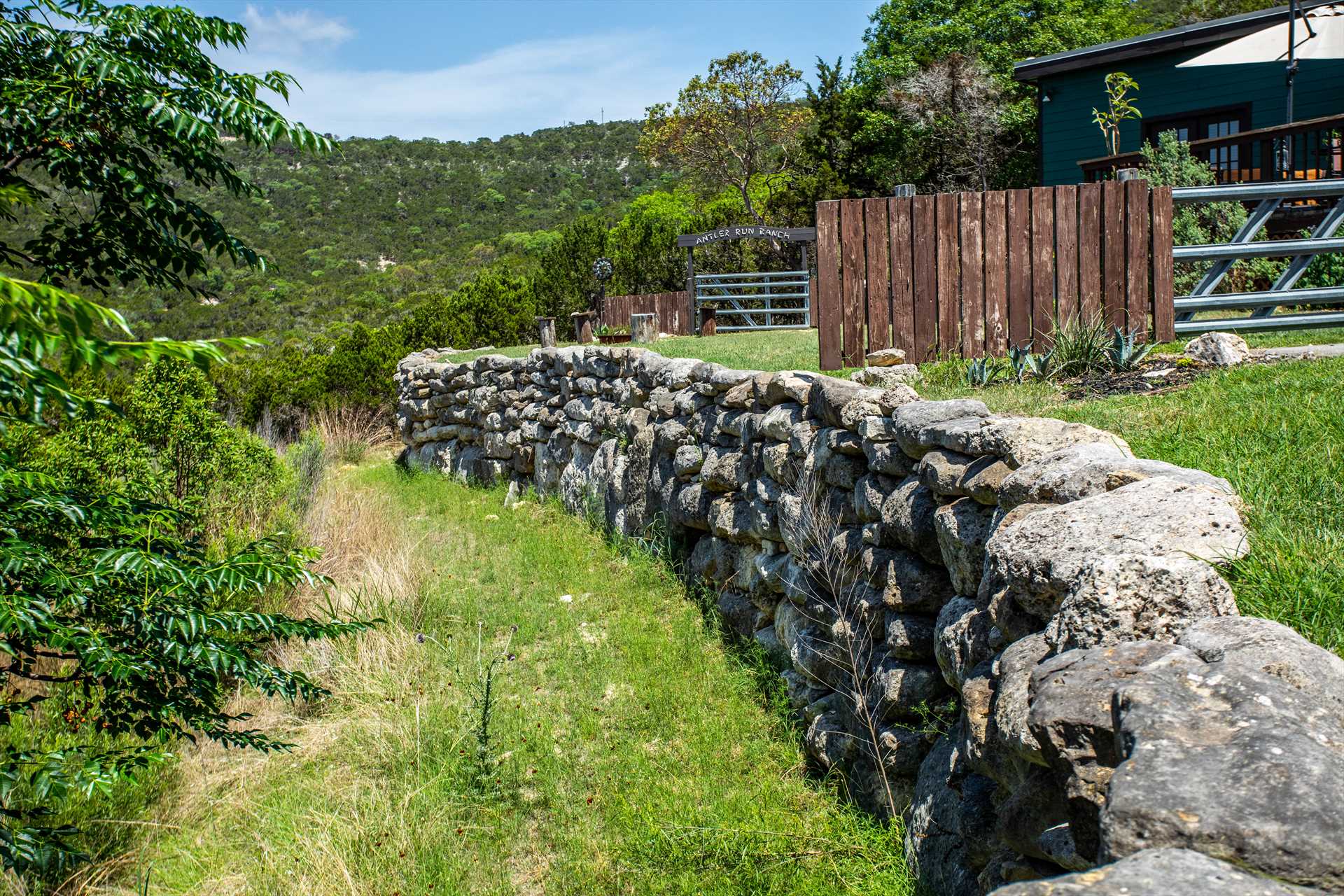                                                 This functional and decorative stone wall is just one of the hundreds of places you'll find at Antler Run Ranch for memorable vacation photos!