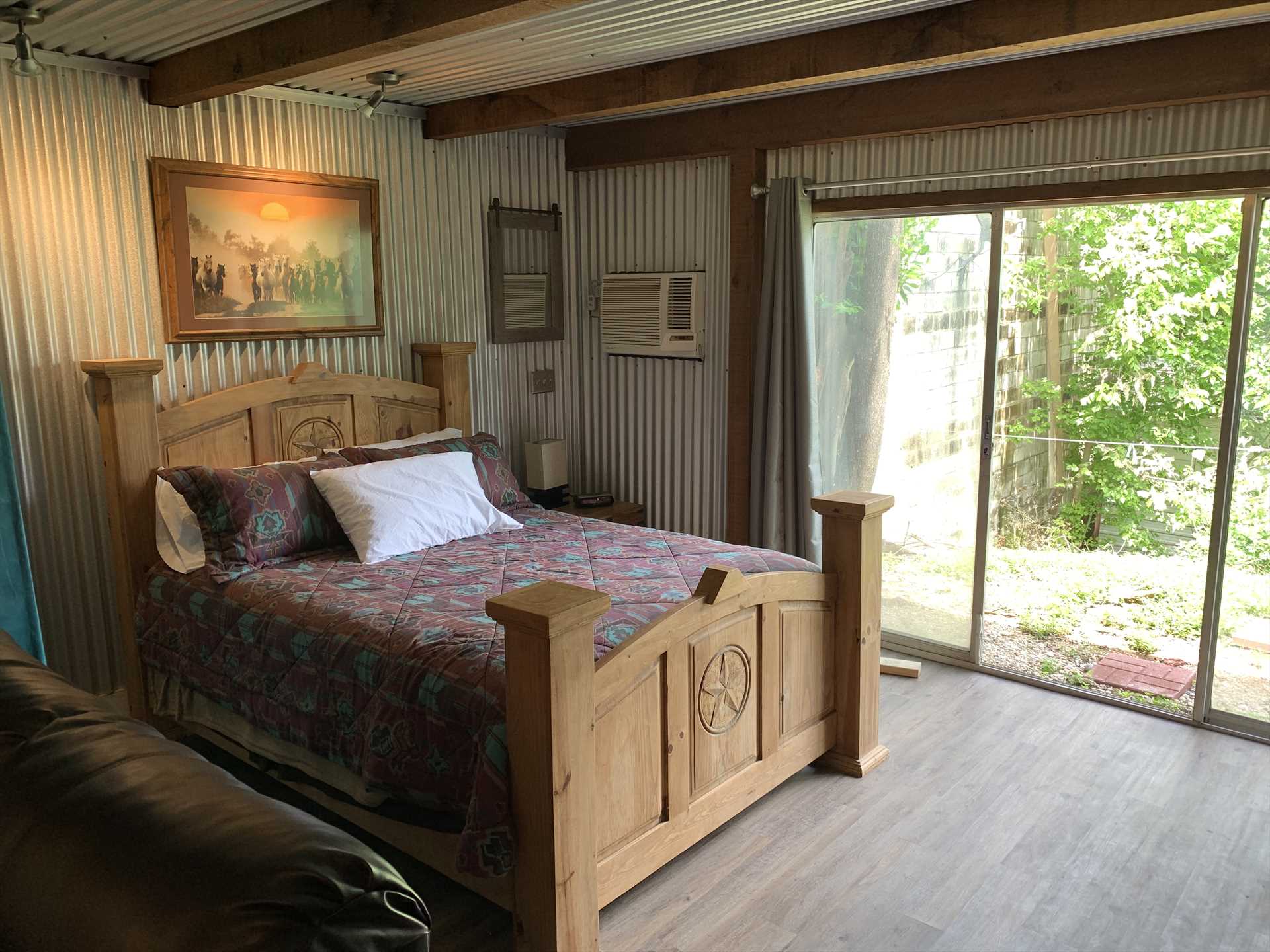                                                 Dream of further Hill Country adventures on the comfy queen-sized bed! Clean linens are provided, and two more guests can rest on the full futon in the living area.