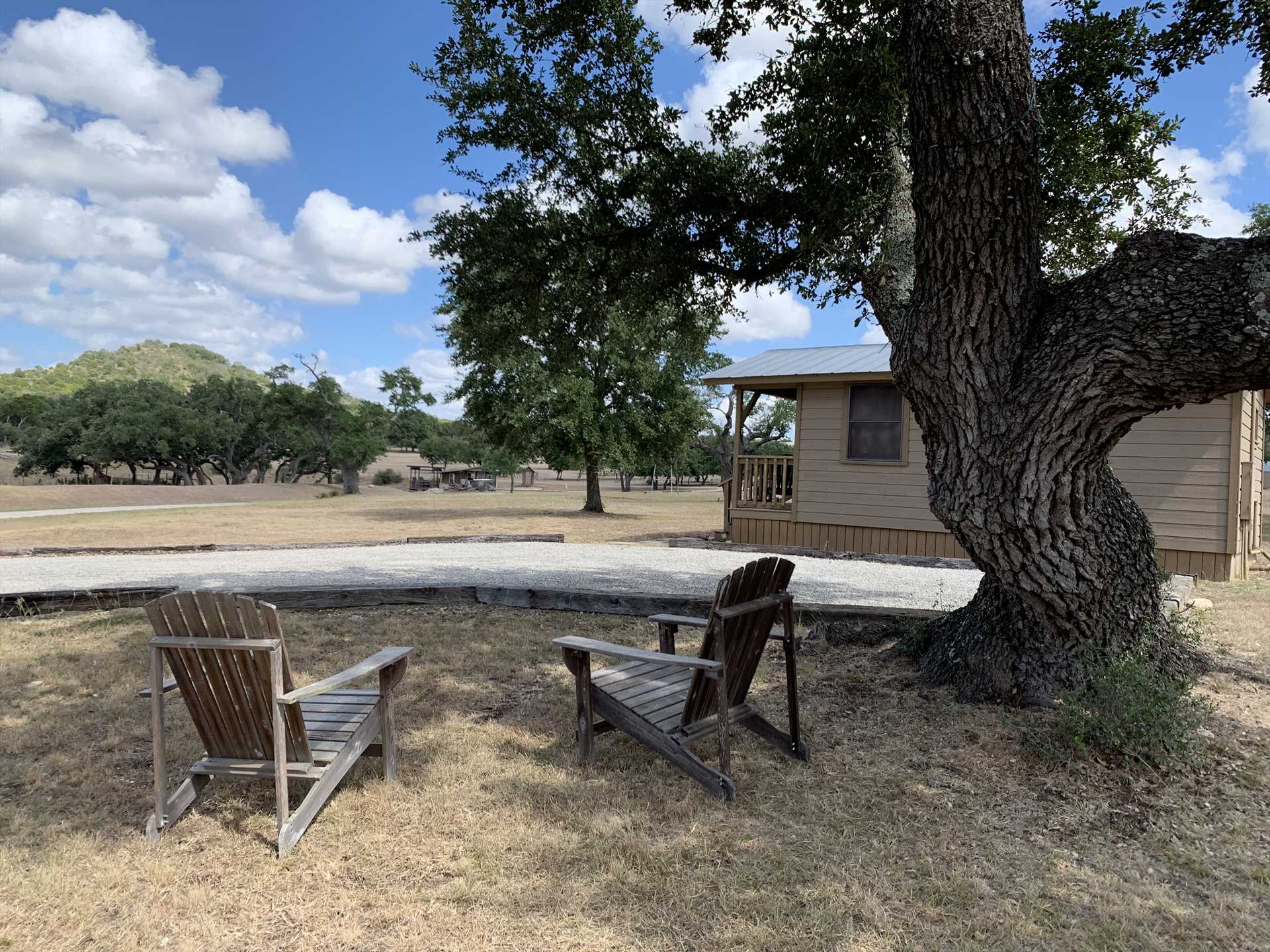                                                 Have yourself a relaxing sit-down under the shady oak in the comfy Adirondack chairs, and savor the Hill Country views and fresh air!