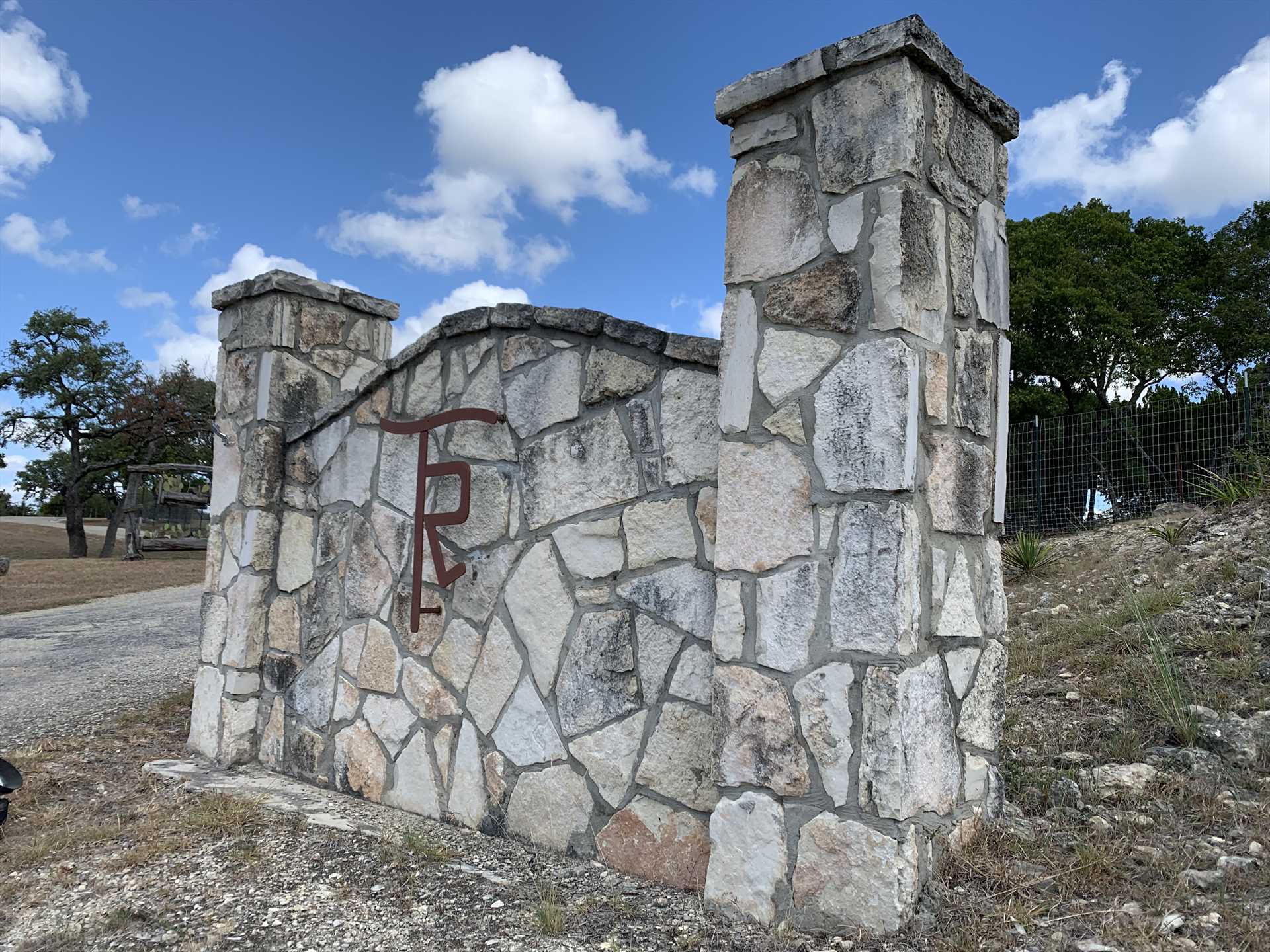                                                 This stone gate on the road marks Tabasco Ranch, and serves as your gateway to a wonderful Hill Country holiday!