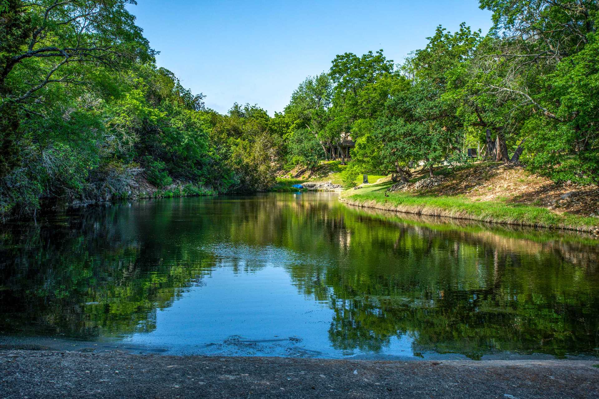                                                 The Homestead sits on 230 scenic Hill Country acres, including the serene bubbling waters of Fall Creek.