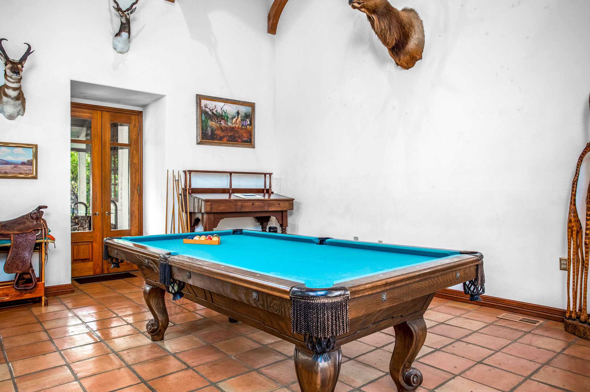                                                 Fishing isn't the only angling going on at the Retreat! Test your billiard angles on the vintage drop-pocket pool table.