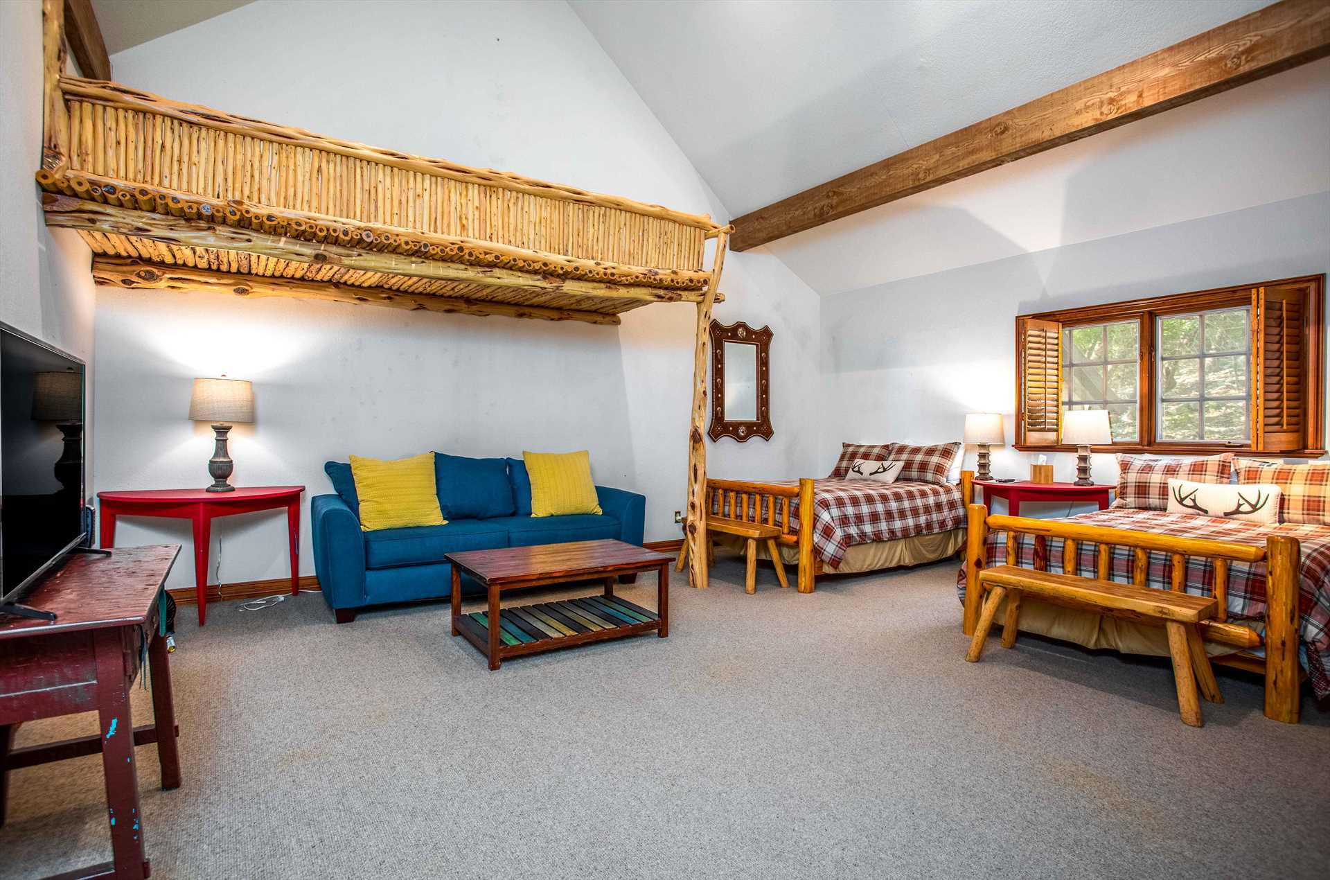                                                 The first bedroom at the Homestead has two twin beds and a double sleeper sofa, offering comfortable rest for up to six people. All the beds on all three properties here come with clean and fresh linens, too!