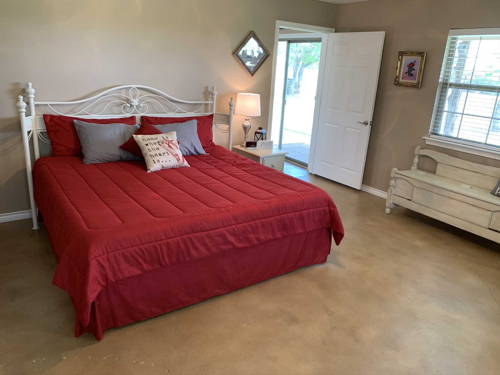                                                 The highlight of the third bedroom here is a plush king-sized bed, draped with clean and warm linens-as are all the beds here!