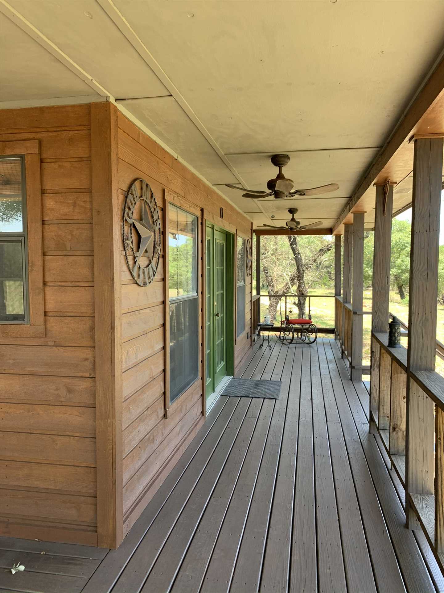                                                 The huge porch at the Hideout provides a comfortable and shaded perch for you to take in those inspiring Hill Country views.