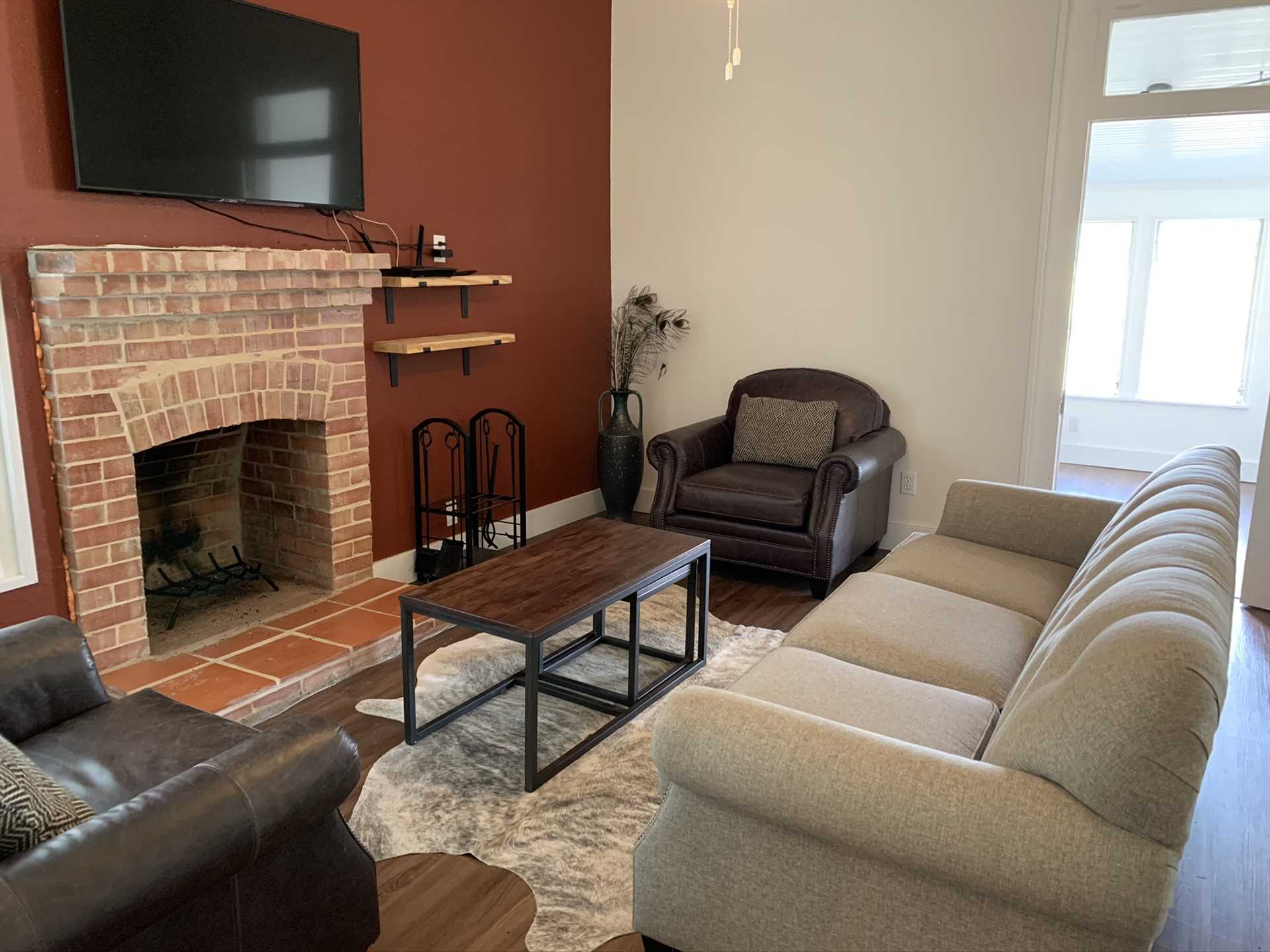                                                 Wifi and the Roku-enhanced TV will keep your crew entertained in the comfy living area, and the electric fireplace will keep chilly nights at bay.