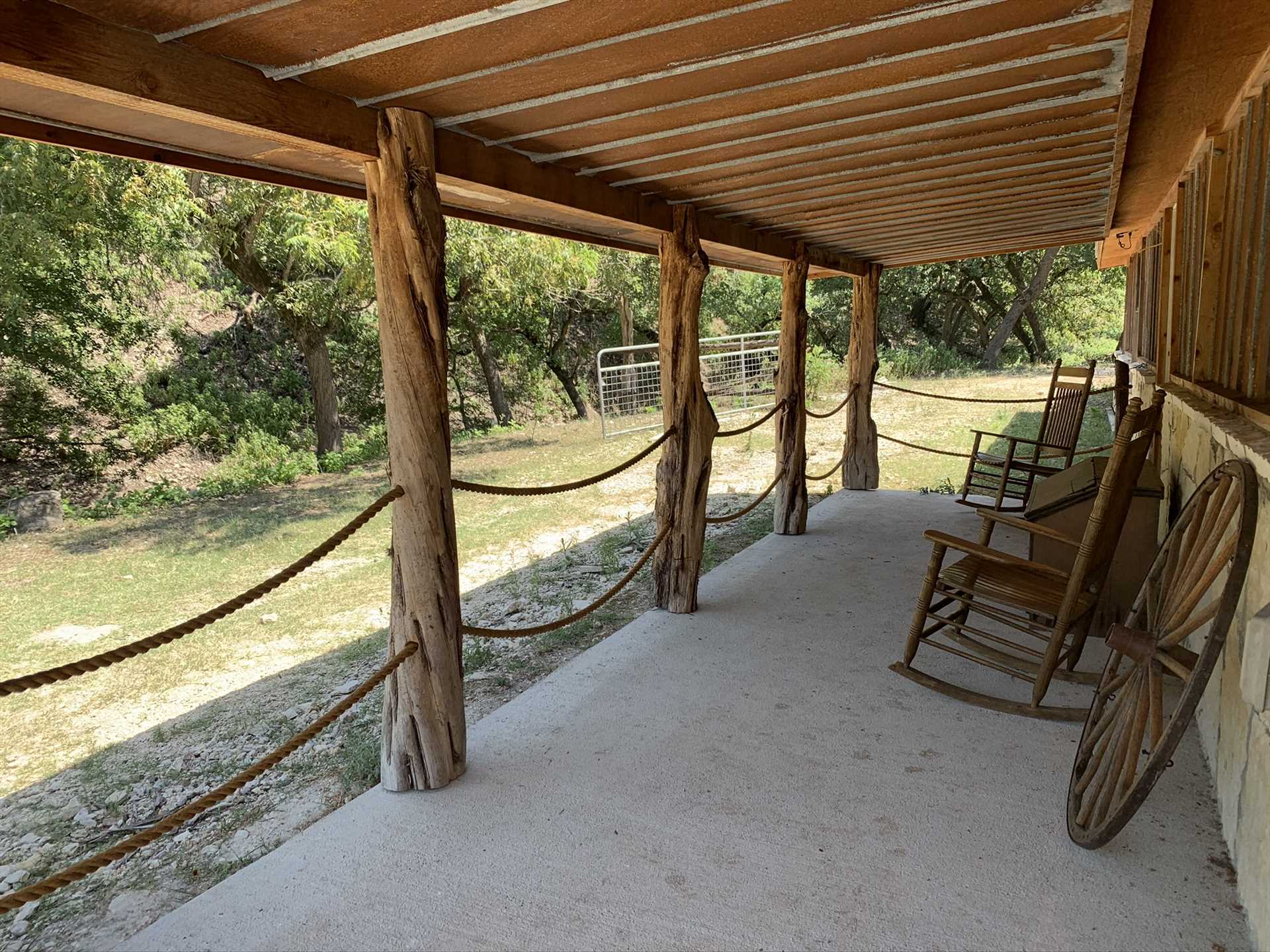                                                 Rock away some quiet and relaxing moments with your creekside view from the shaded patio.