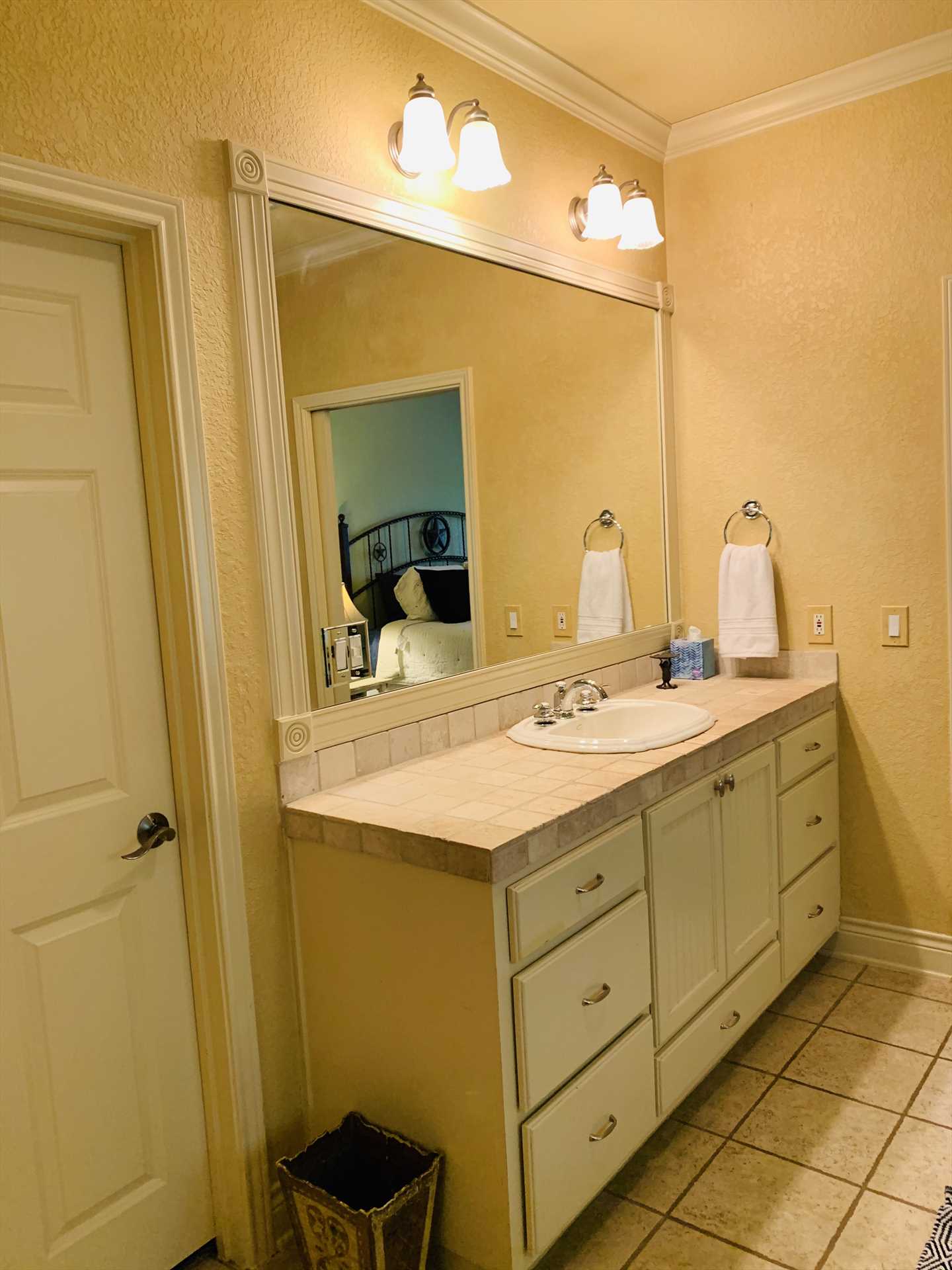                                                 The master bath also includes a big vanity with plenty of counter space, a walk-in closet, and all bathrooms and bedrooms include plenty of soft and fluffy linens.