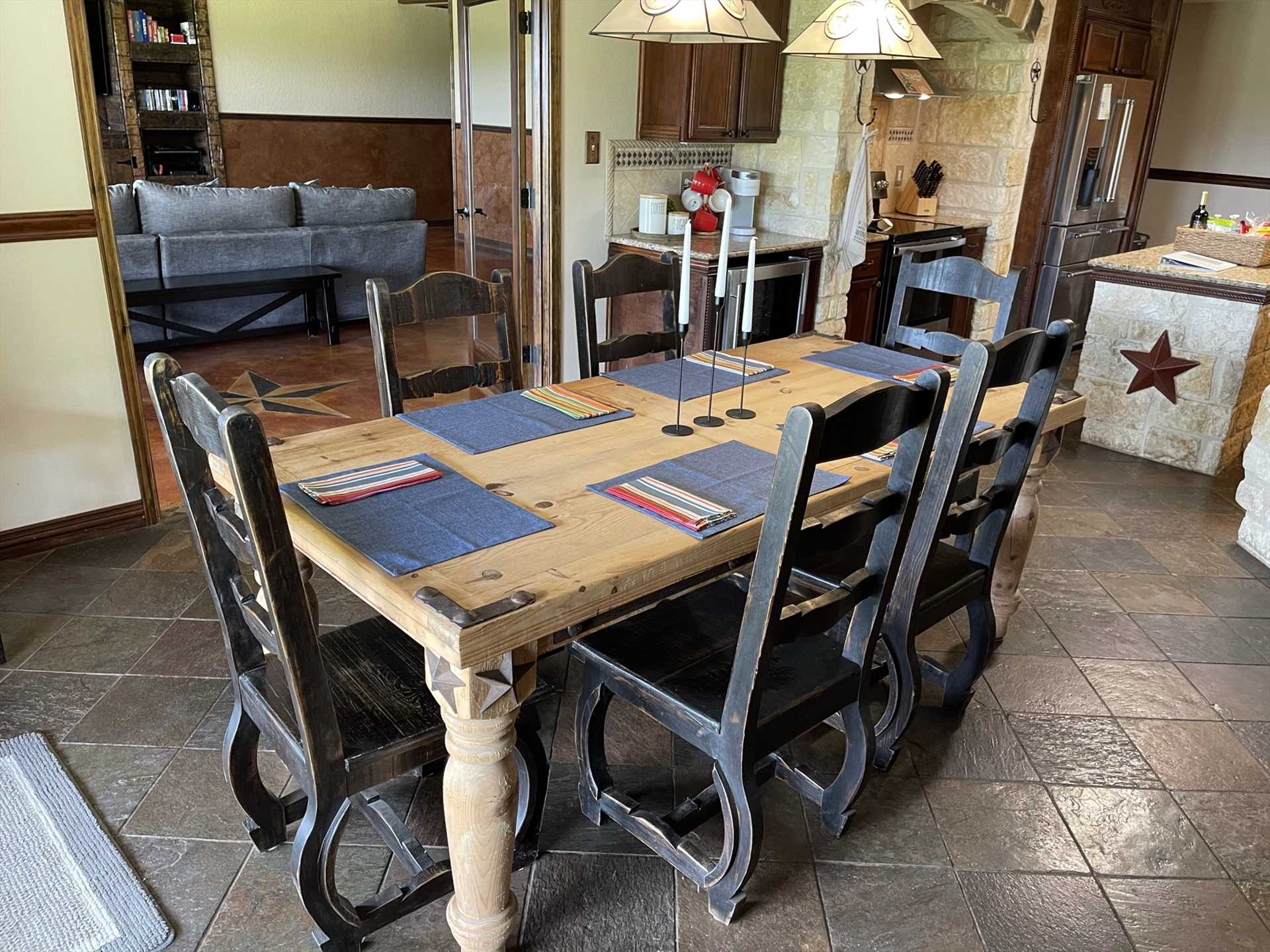                                                 Ample seating space with tasteful country touches make the dining area a wonderful place to gather.