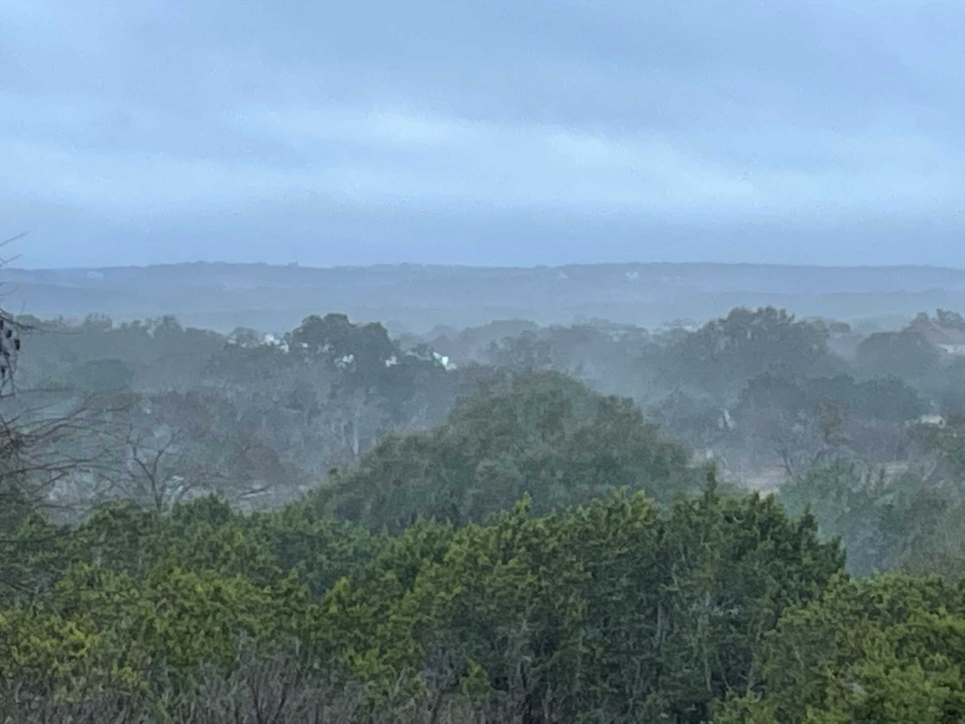                                                 Misty treetop views of the rolling Hill Country will greet you every day at the Boerne Mountain Retreat!