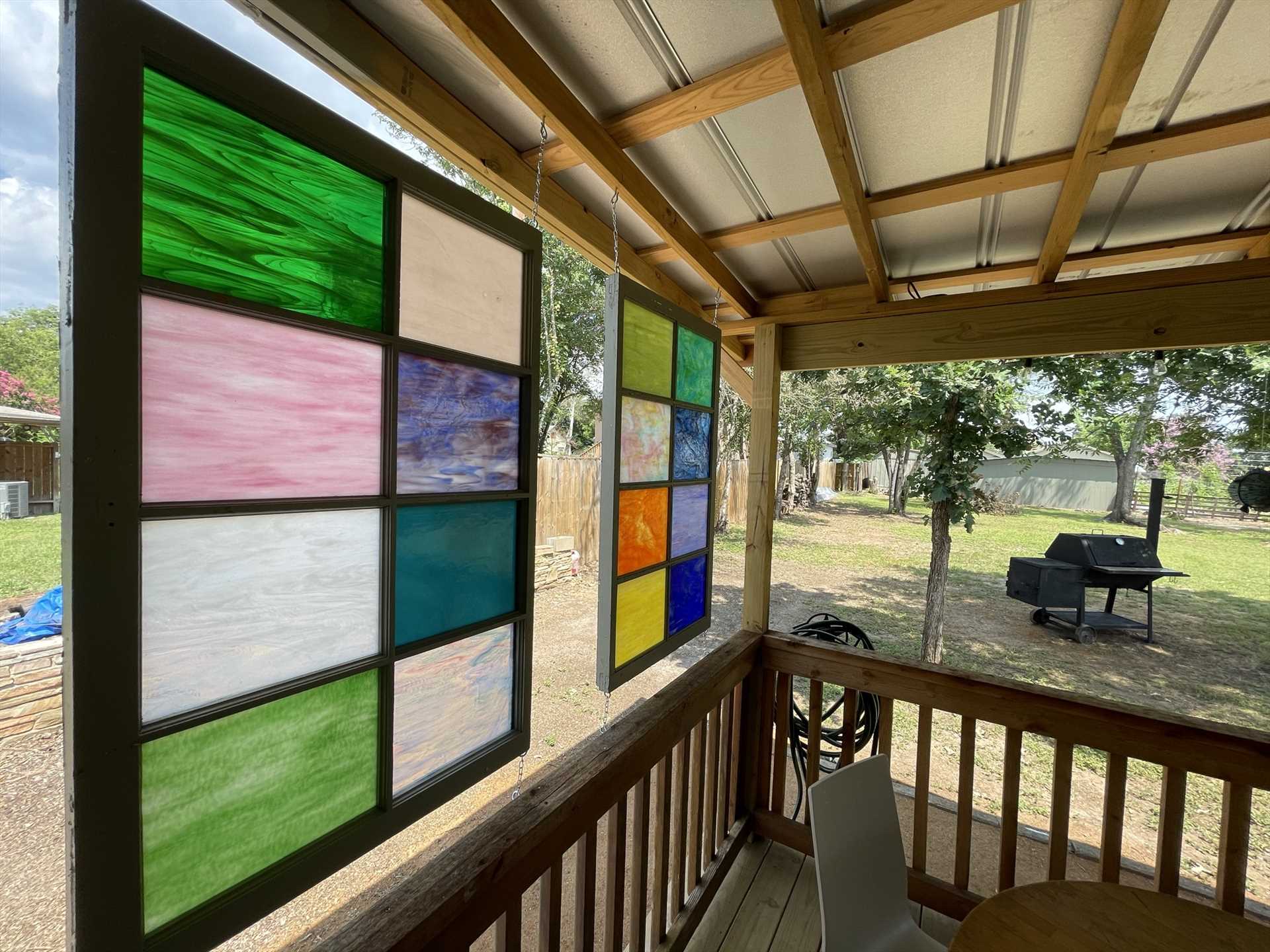                                                 The kids will love the roomy back yard, and you'll love the privacy and brilliant colors the glass panels provide!