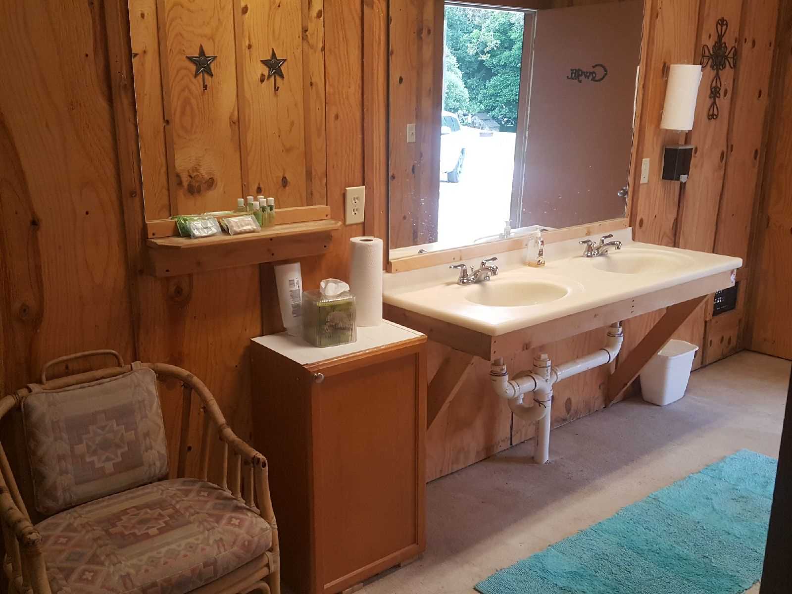                                                 You'll find double vanities, a shower, and a washer and dryer combo in the Bath House-and all bath linens are provided.