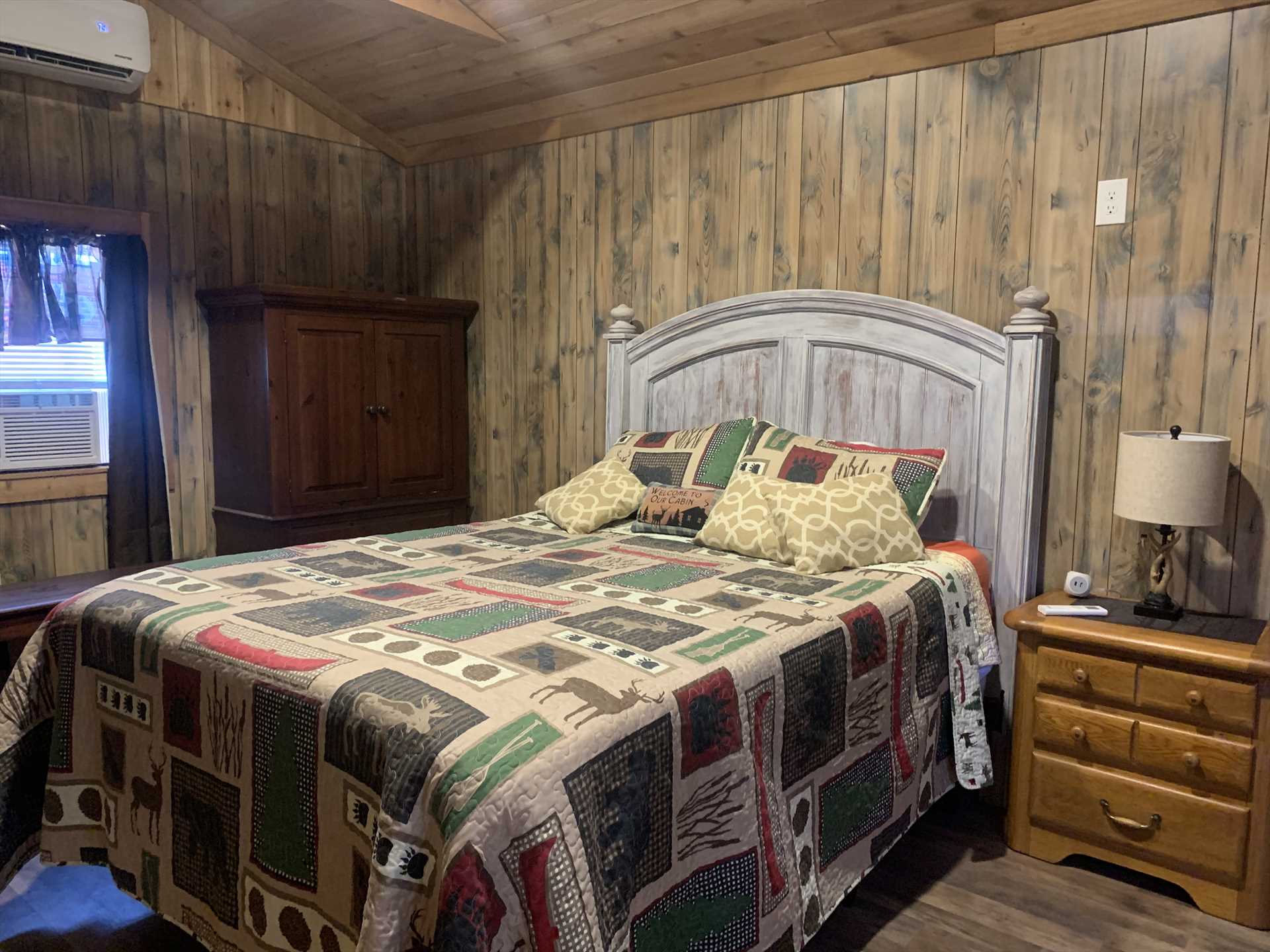                                                 The cabin's bedroom features an enormous and comfortable king-sized bed, and all bed linens are included as part of your stay.